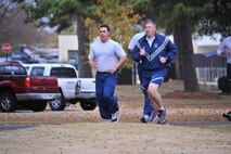 Tech. Sgt. Steven Pierce Jr. and Master Sgt. Shane Merillar, both from Air Force Legal Operation Agency and attending the Senior NCO Professional Development Seminar, run during a physical training session at Maxwell Air Force Base, Nov. 21. The annual course also serves as the lead up to the senior NCO induction ceremony. (U.S. Air Force photo by Airman 1st Class William Blankenship)
