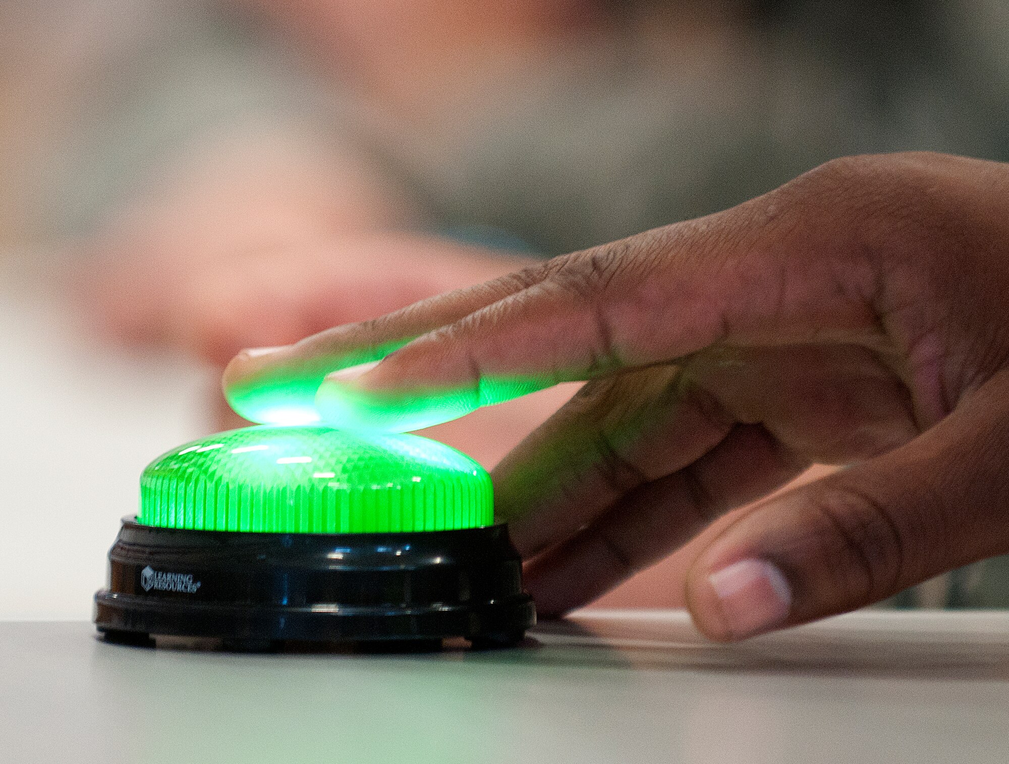 131121-F-JW079-122
Senior Airman William Shelby, 90th Force Support Squadron fitness specialist, signals he knows an answer during the question and answer round of Freedom Hall Fitness Center’s Fitness Specialist Challenge Nov. 21. Five teams vied for the title of top fitness specialist on F.E. Warren. (U.S. Air Force photo by R.J. Oriez)