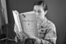 WESTOVER AIR RESERVE BASE, Mass. -- SrA. Heather Wilson poses for a photograph that will be used in an issue of the Patriot for a book review. (U.S. Air Force photo/William C. Pope)