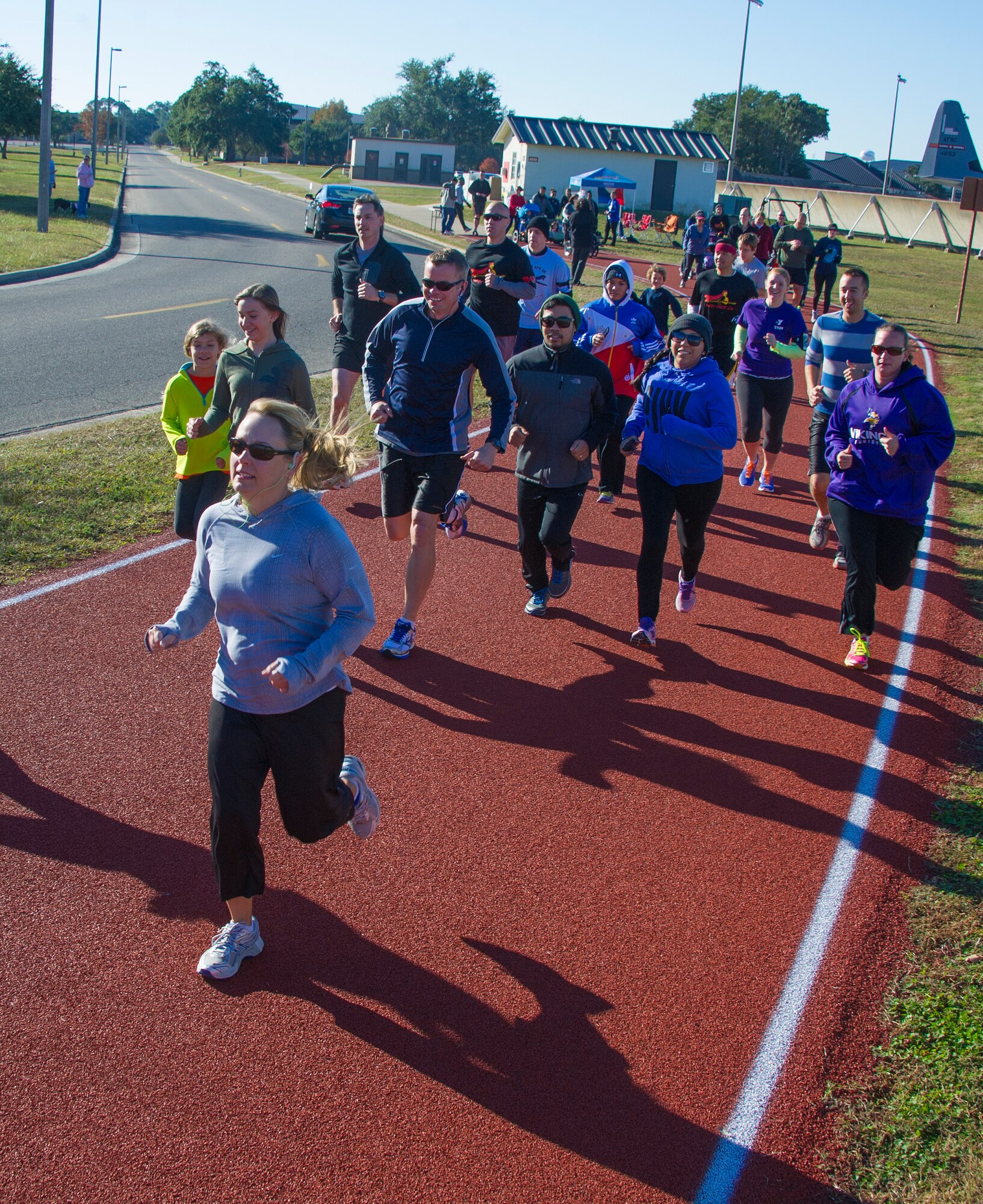 Keesler personnel participate in a 5km run Nov. 30, 2013, at Keesler Air Force Base, Miss.  The event, sponsored by the 333rd Training Squadron key spouses, was in support of the Philippine typhoon relief effort.  (U.S. Air Force photo by Adam Bond)
