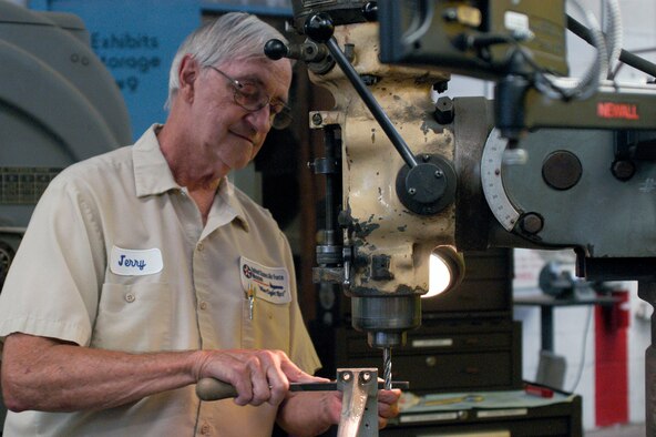 DAYTON, Ohio -- Jerry Archer, a volunteer machinist in the Restoration Division, works on a small part for the B-17F "Memphis Belle." (U.S. Air Force photo)