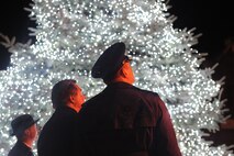 Minot Air Force Base installation commander and 5th Bomb Wing commander, Col Alex Meyzinski, spoke during the ceremony of the annual tree lighting in downtown Minot Nov. 30, 2013, wishing a happy holiday to both Team Minot and the Minot community. Other speakers included the Mayor of Minot, and Pastors from St. Leo’s Catholic Church. The ceremony concluded with a fire work display. (U.S. Air Force photo/Airman 1st Class Lauren Pitts)