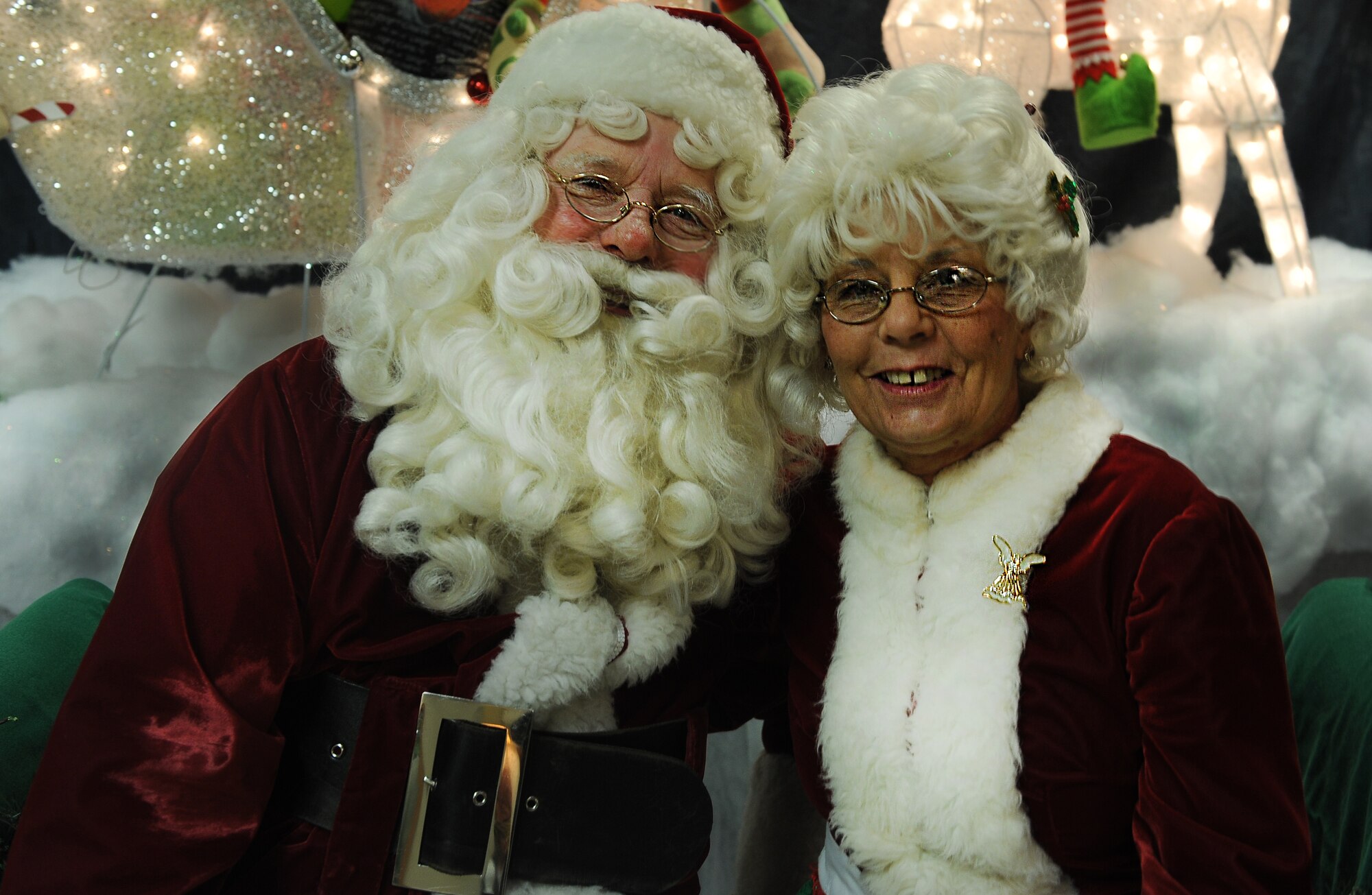 Santa and Mrs. Claus made an appearance in downtown Minot for the annual tree lighting Nov. 30, 2013. The two partook in Minot’s holiday celebration by taking photos and overseeing wish lists. (U.S. Air Force photo/Airman 1st Class Lauren Pitts)