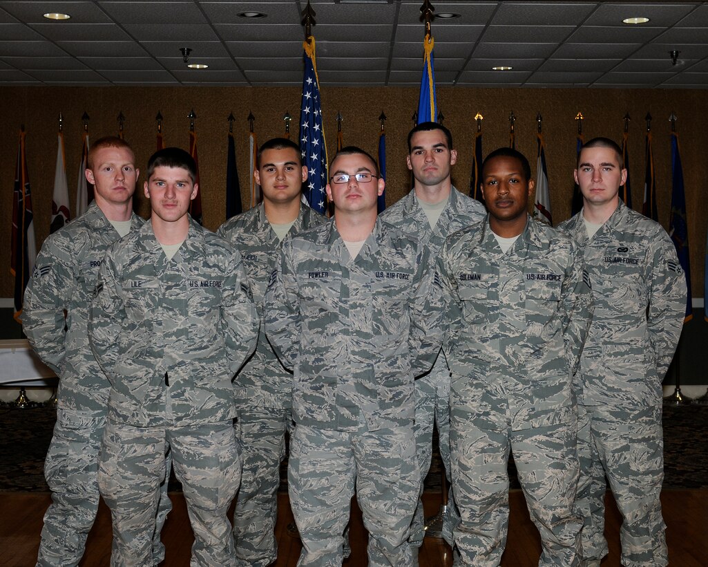 (Left to right) Senior Airman Beret Proctor, 50th Flying Training Squadron, Airman 1st Class Daniel Lile, 14th Flying Training Wing Public Affairs, Senior Airman Jason Laufer, 14th Civil Engineer Squadron, Staff Sgt. Christopher Fowler, 14th Communications Squadron, Staff Sgt. Joshua Keith, 14th Operations Support Squadron, Staff Sgt. Aaron Coleman, 14th Comptroller Squadron, and Senior Airman Charles Dickens, 14th Flying Training Wing Public Affairs pose for a photo at the Enlisted Promotions ceremony Nov. 26 at the Columbus Club.

