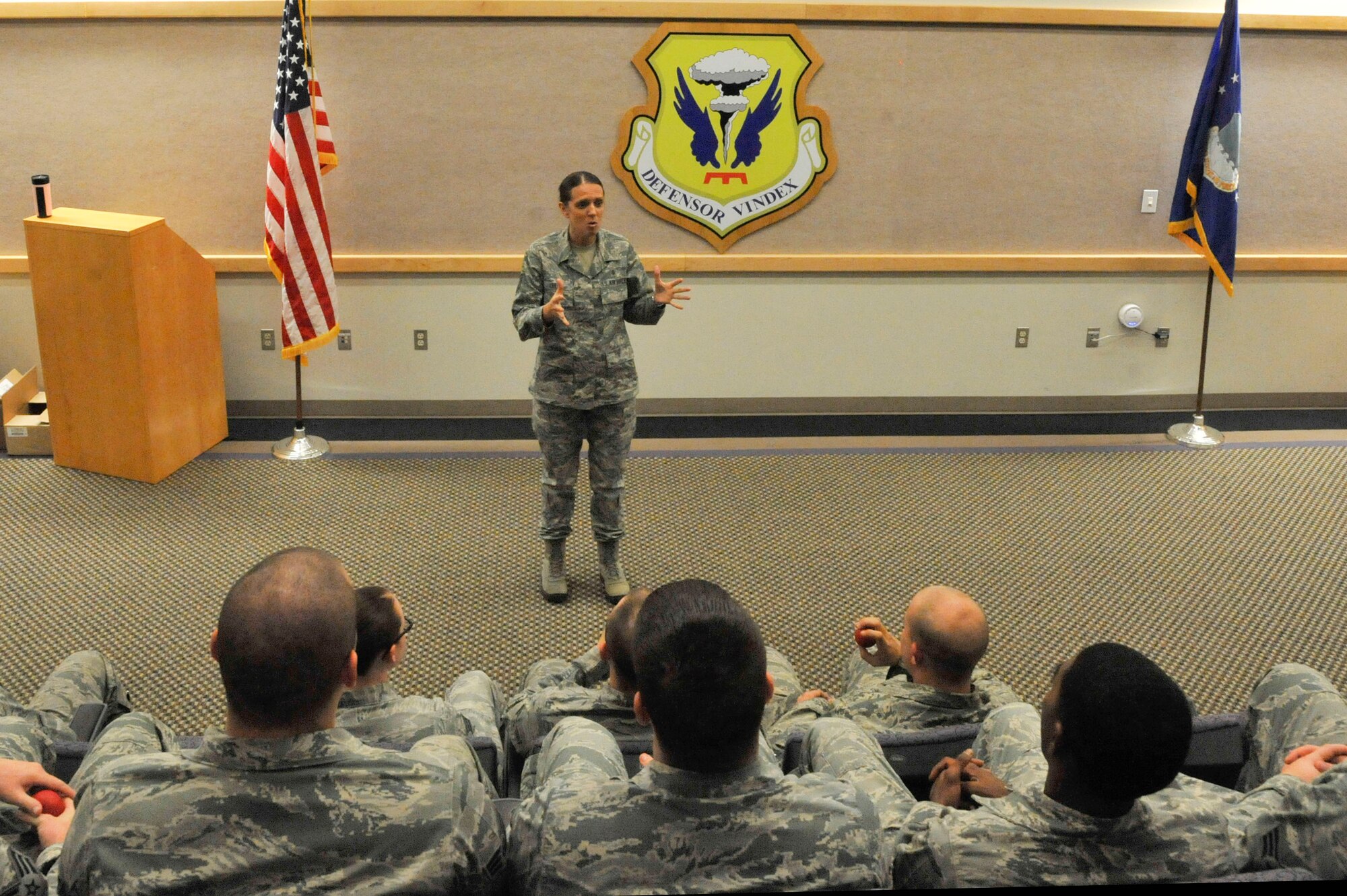 Tech. Sgt. Tabetha Coley, 509th Force Support Squadron Airmen Leadership School instructor, briefs Airmen on quitting tobacco at Whiteman Air Force Base, Mo., Nov. 21, 2013. The Great American Smokeout serves as a platform to publicize the health hazards of smoking. (U.S. Air Force photo by Airman 1st Class Keenan Berry/Released). 