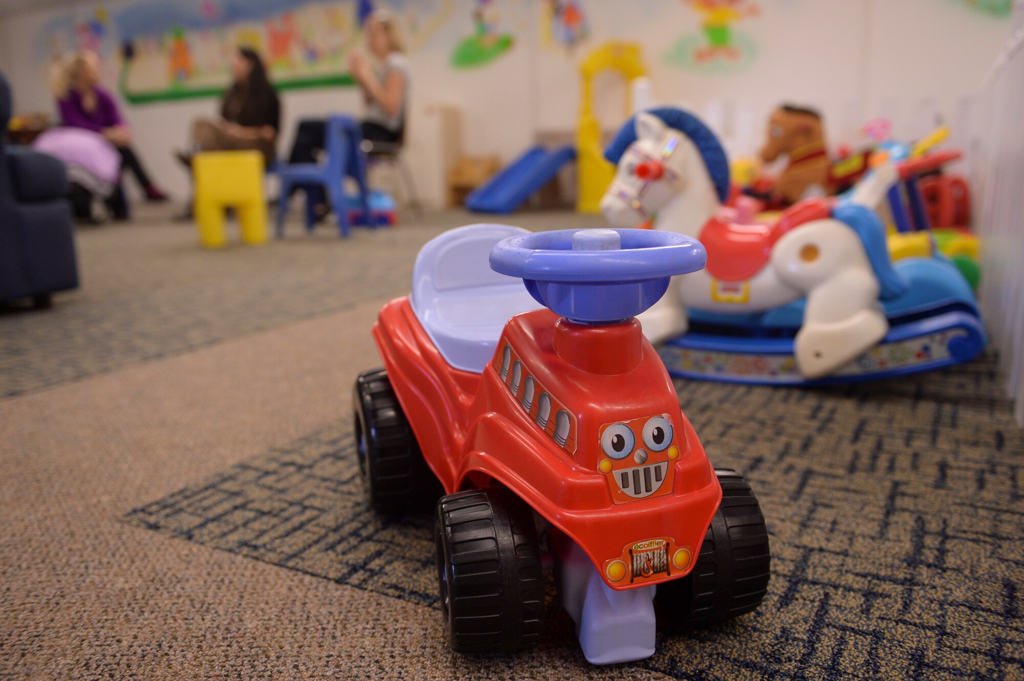 SPANGDAHLEM AIR BASE, Germany-- A toy truck is displayed on the floor inside a play group room during a Family Advocacy Play Group meeting Dec. 3, 2013. Family Advocacy hosts the meetings every Tuesday and Thursday between 10 a.m. and 12 p.m. (U.S. Air Force photo by Senior Airman Rusty Frank/Released)
