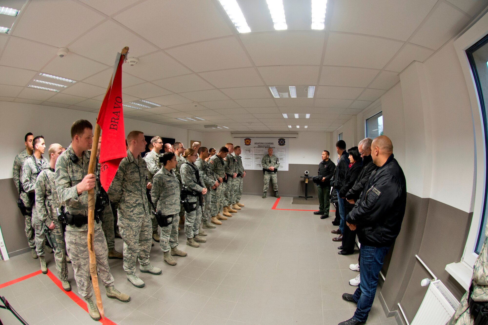 Members of the Cops 4 Causes organization attend guard mount at the 569th U.S. Forces Police Squadron, Nov. 22, 2013, Vogelweh, Germany. While visiting various facilities in the KMC, the Cops 4 Causes provided 700 care packages to
military members stationed here. (U.S. Air Force photo/ Senior Airman Jonathan
Stefanko)
