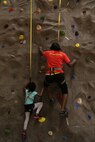 Marines and their families gather at the rock wall inside the AS-4400 gym aboard Marine Corps Air Station New River, as part of the Family Rock Wall Climbing Night, Nov. 22. The Family Rock Wall Climbing Night is hosted every Friday evening from 6-9 p.m. 