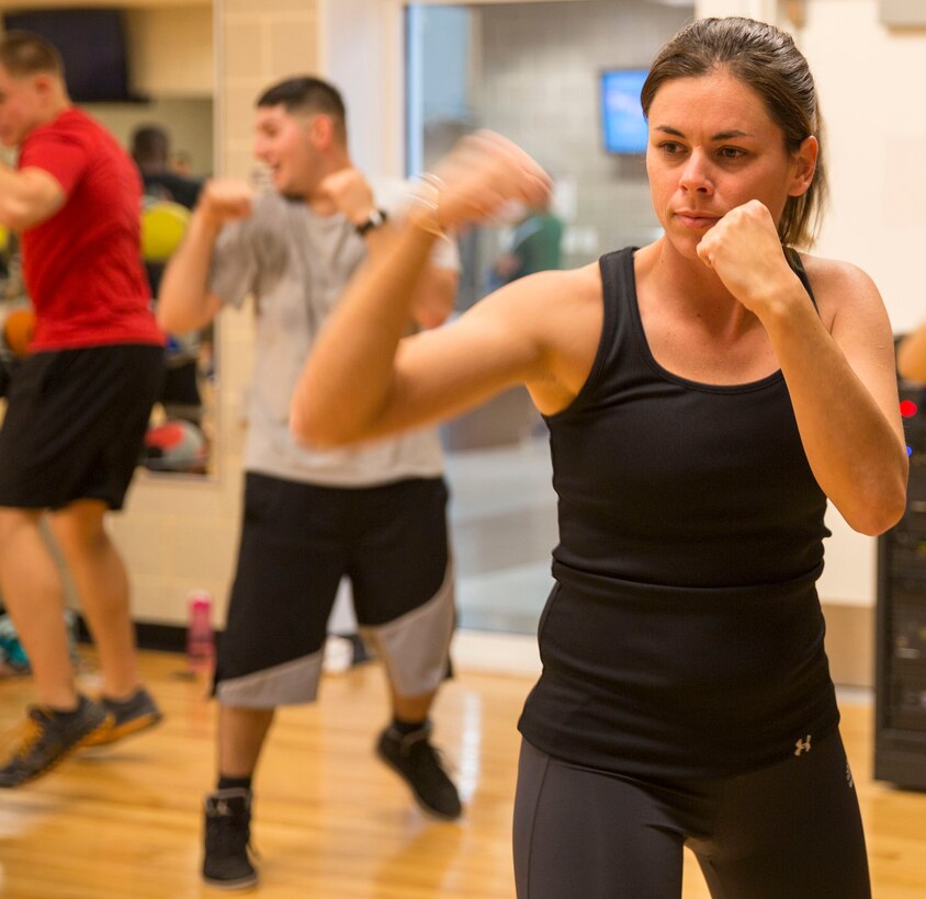 Lauren Acosta, a student at the Wallace Creak Fitness Center's Cardio Kickboxing class  performs a variety of fast paced jabs, Dec. 2. The Cardio Kickboxing class takes place Monday's at 11:30 a.m. as well as Tuesday's and Thursday's at 9:30 a.m.