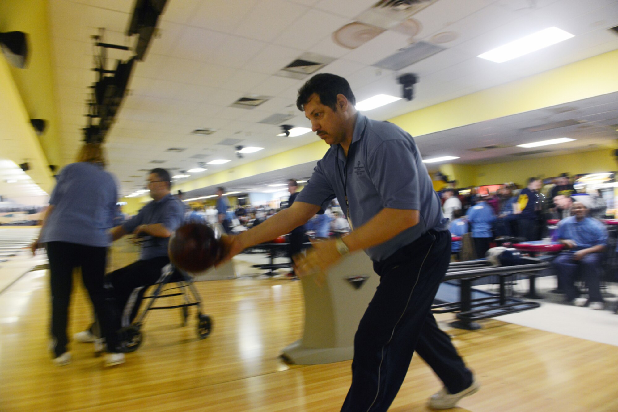 JOINT BASE ELMENDORF-RICHARDSON, Alaska -- Christopher Lambert, a bowler from Anchorage, prepares to release his ball during the Special Olympics Bowling Tournament at the Joint Base Elmendorf-Richardson Polar Bowl from Nov. 22 through 24. Participants came from different portions of Alaska to qualify for more competitions. (U.S. Air Force photo/Airman 1st Class Ty-Rico Lea)