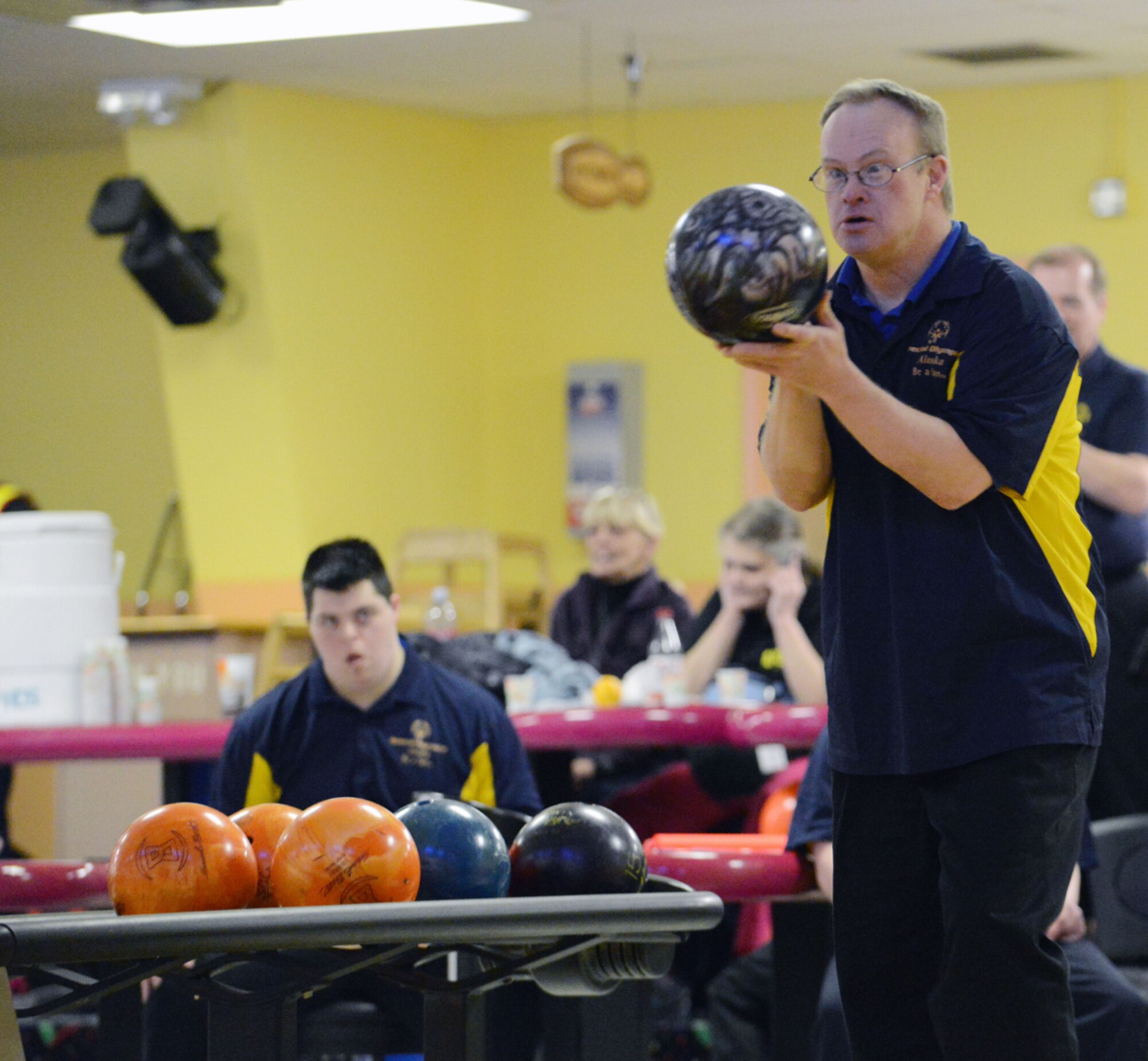 JOINT BASE ELMENDORF-RICHARDSON, Alaska -- Patrick White a bowler from Matanuska-Sustina Borough prepares to bowl during the Special Olympics Bowling Tournament at the Joint Base Elmendorf-Richardson Polar Bowl from Nov. 22 through 24. Participants have come from different portions of Alaska to qualify for more competitions. (U.S. Air Force photo/Airman 1st Class Ty-Rico Lea)