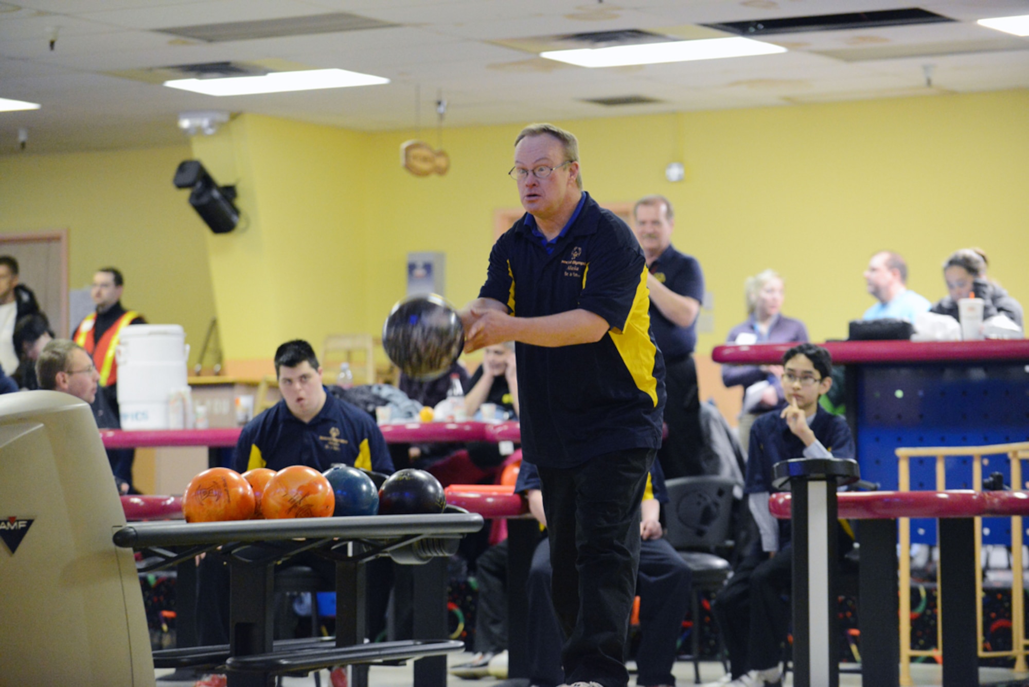 JOINT BASE ELMENDORF-RICHARDSON, Alaska -- Patrick White, a bowler from Matanuska-Sustina Borough prepares to bowl during the Special Olympics Bowling Tournament at the Joint Base Elmendorf-Richardson Polar Bowl from Nov. 22 through 24. Participants have come from different portions of Alaska to qualify for more competitions. (U.S. Air Force photo/Airman 1st Class Ty-Rico Lea)