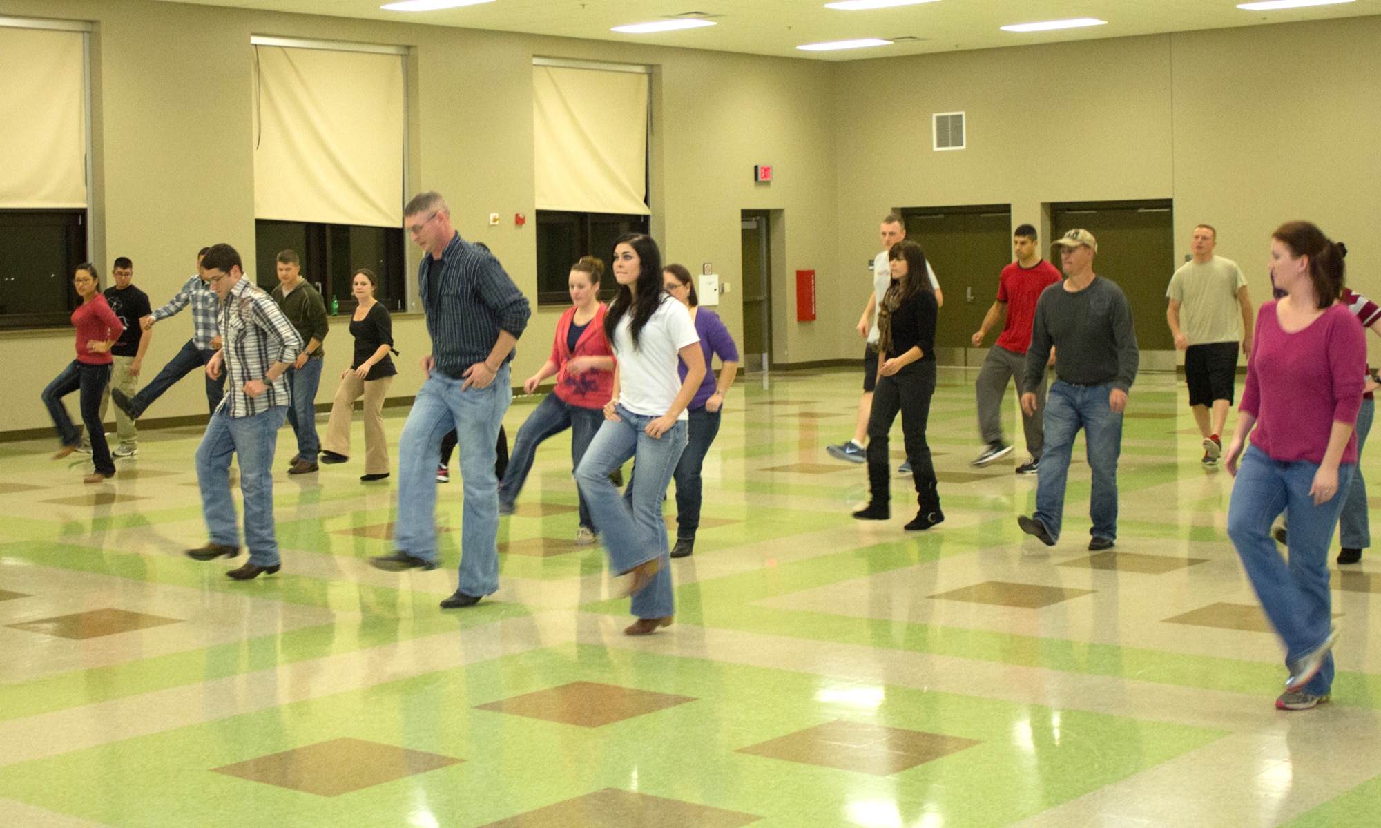 Team Vance members work on their line-dance steps during a class held Nov. 14 in the Armed Forces Reserve Center at Vance Air Force Base, Okla. The classes are in preparation for the Masquerade Ball Jan. 11. (Courtesy photo)
