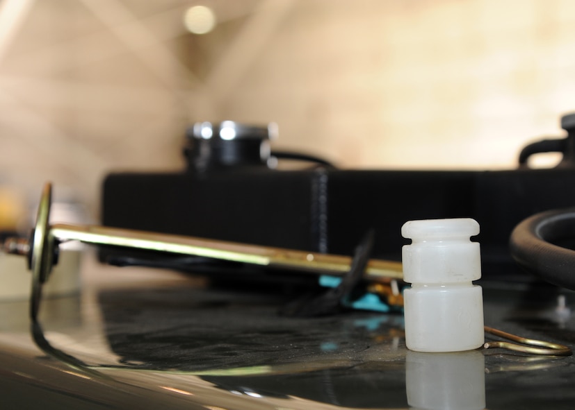 A fuel sending unit and float rest on a self-generating nitrogen cart at Barksdale Air Force Base, La., Dec. 3, 2013. The float moves up and down when the fuel levels change, sending a signal to the fuel gauge signifying the level of fuel in the tank. (U.S. Air Force photo/Senior Airman Joseph A. Pagán Jr.)