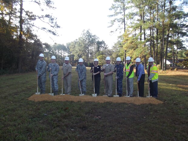 Joint Base Charleston leadership breaks ground for the new Naval Exchange Student Store Dec.  4, 2013, at JB Charleston – Weapons Station, Goose Creek, S.C. The new store on Fletcher Dr., will be adjacent to the Naval Nuclear Power Training Command campus. The project includes expanded sales floor space and space for two name brand concept outlets with an enlarged dining and gathering area. (Courtesy photo) 