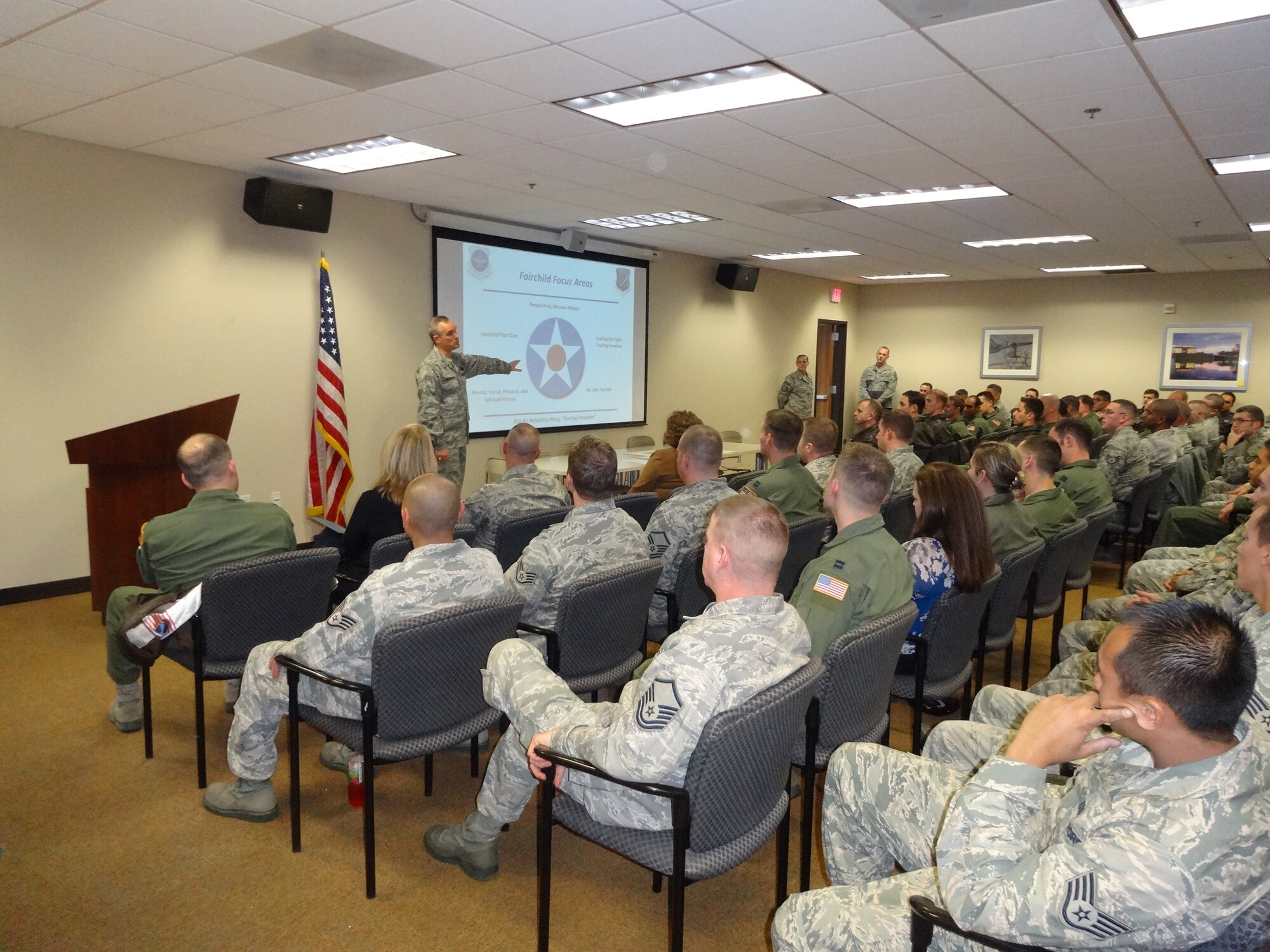 Col. Brian Newberry, the 92nd Air Refueling Wing commander, speaks with Airmen assigned to the 912th Air Refueling Squadron at March Air Reserve Base, Calif., Nov. 22, 2013. The colonel is the administrative commander for 912th ARS Airmen and said during his visit that they have demonstrated incredible imagination, flexibility and vision as critical members of his Total Force team. (U.S. Air Force courtesy photo/Released)