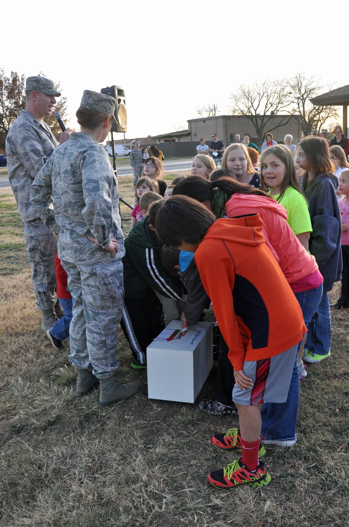 GOODFELLOW AIR FORCE BASE, Texas – Military children wait as Capt. Robert Bohnsack, 17th Training Wing chaplin,  counts down to zero and the lighting of the holiday tree during the Holiday Tree Lighting Ceremony at the base chapel Dec. 3. Military members and their families came out to enjoy this traditional holiday celebration. (U.S. Air Force photo/ Airman 1st Class Breonna Veal)