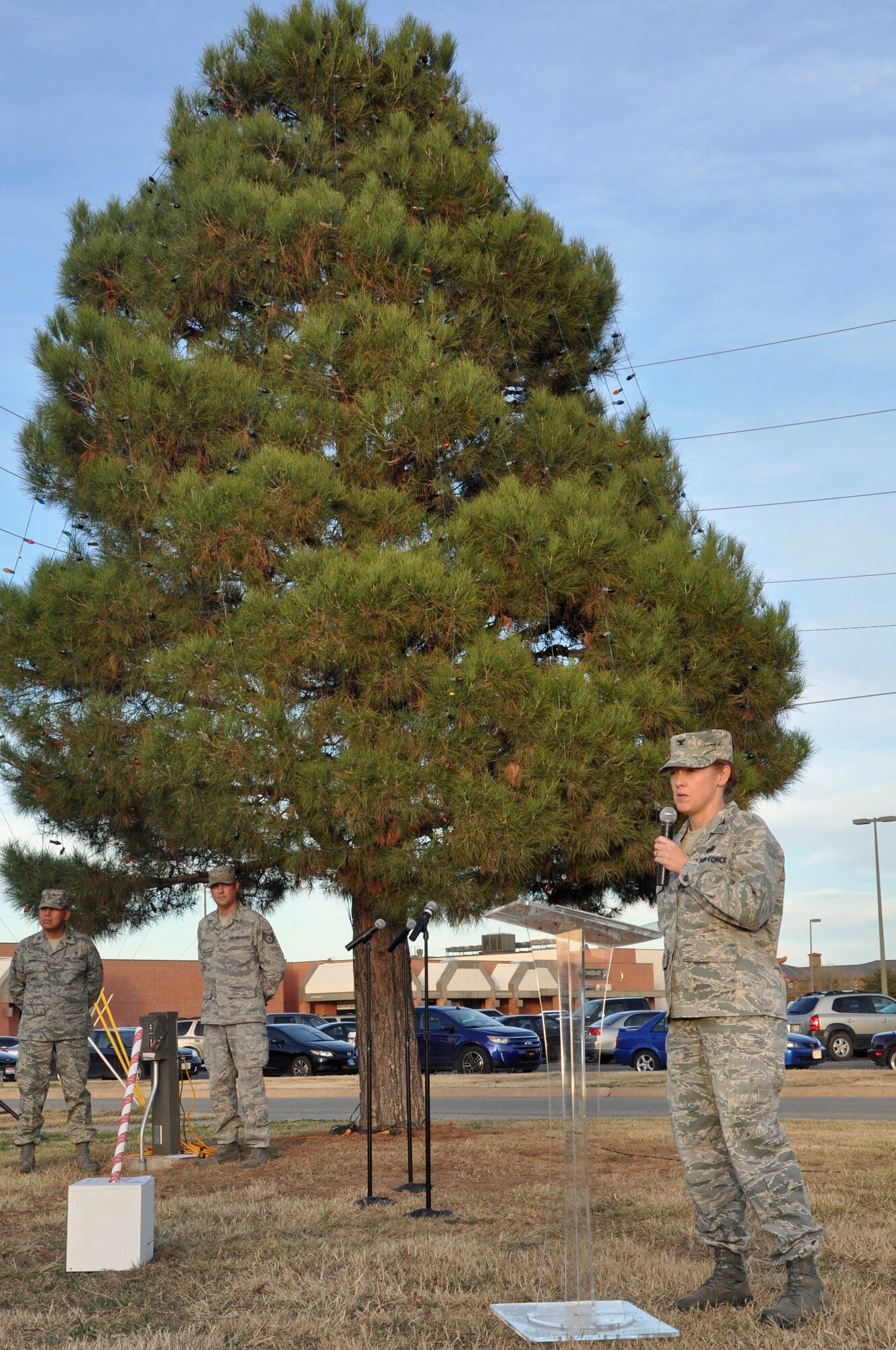 GOODFELLOW AIR FORCE BASE, Texas – Col. Kimberlee Joos, 17th Training Wing Commander, greets Team Goodfellow members and their families during the Holiday Tree Lighting Ceremony at the base chapel Dec. 3. Col. Joos expressed her wishes for Team Goodfellow to remember the service members that are deployed during this holiday season. (U.S. Air Force photo/ Airman 1st Class Breonna Veal)