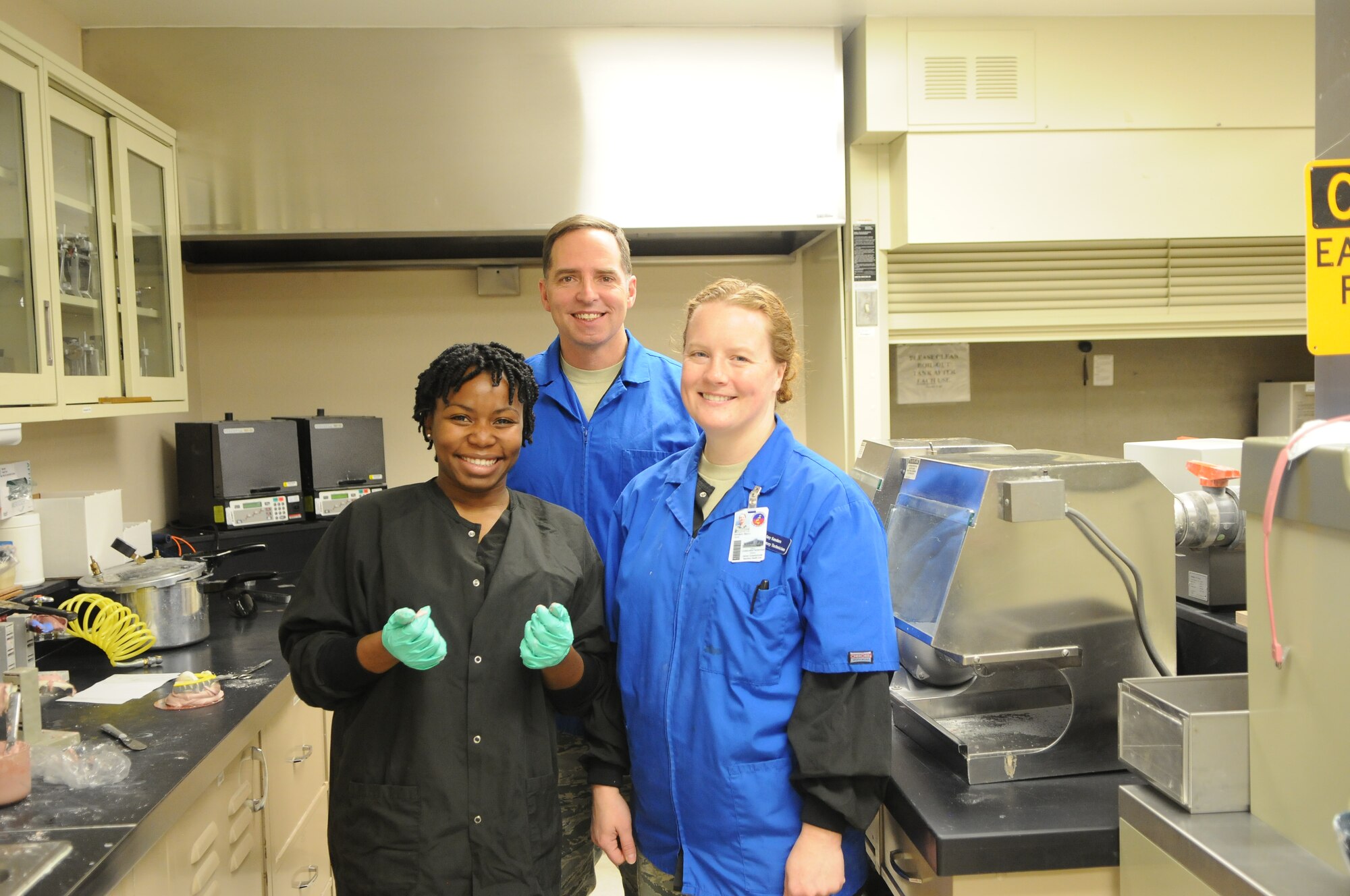 Dental Laboratory Technology is both a science and an art. Since each dental patient's needs are different, the duties of a technician are comprehensive and diverse. Technician duties include fabricating fixed and removable prosthesis; such as, crowns, bridges, veneers, retainers, dentures and implants in accordance with the Dentist’s prescription. In some labs, the tech is responsible for oral maxillo-facial reconstruction (eyes, ears, and noses) to aid cancer patients and wounded warriors. Their role in the 5th Bomb Wing and 91st Missile Wing missions is to ensure all members are deployable and our PRP personnel are “Fit and Clear.” Essentially, they put the “Bite in the Fight” and the “Bling in the Wing!” (Photo courtesy of the Command Chief’s Office)