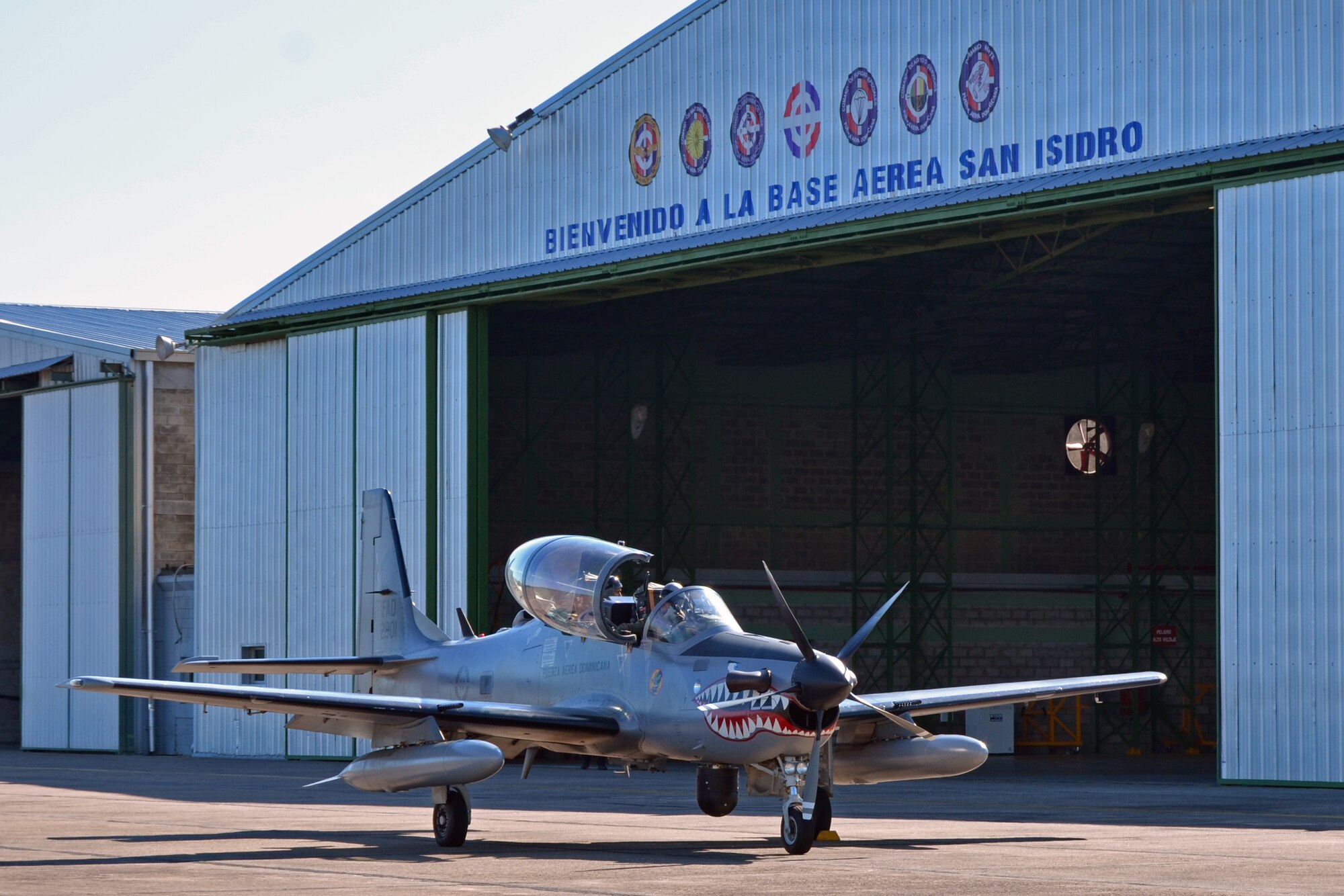 A Dominican Republic air force A-29 Super Tucano prepares for a mission as part of an exercise to combat illegal drug trafficking Dec. 3, 2013, over the skies of the Caribbean. The exercise is part of the Sovereign Skies Program, an initiative between the U.S., Colombian, and Dominican Republic air forces to share best-practices on procedures to detect, track and intercept illegal drugs moving north from South America. (U.S. Air Force photo by Capt. Justin Brockhoff/Released)





