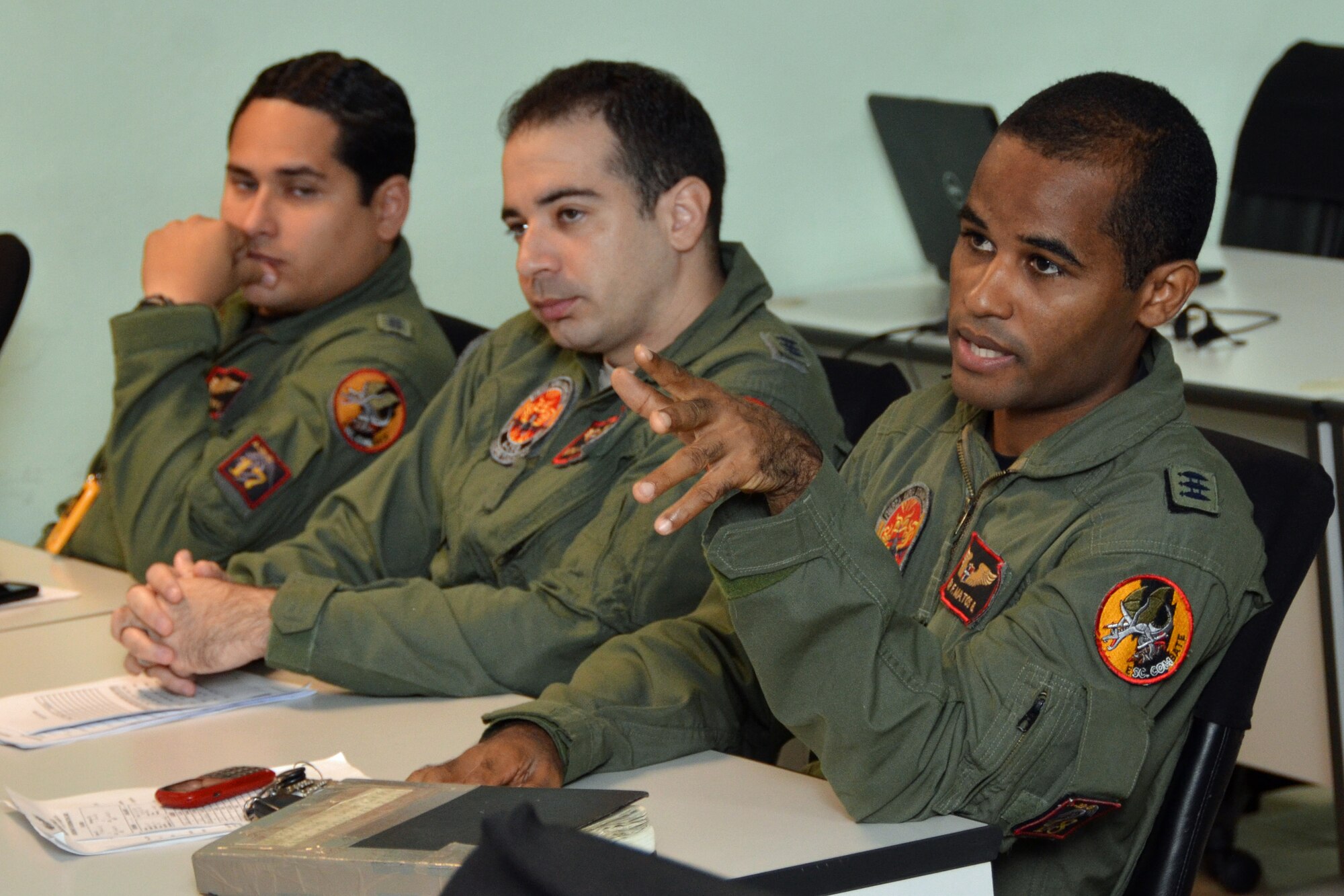 Three Dominican Republic air force A-29 Super Tucanos prepare for a mission as part of an exercise to combat illegal drug trafficking Dec. 3, 2013. The exercise is part of the Sovereign Skies Expansion Program, an initiative between the U.S., Colombian, and Dominican Republic air forces to share best-practices on procedures to detect, track and intercept illegal drugs moving north from South America. (U.S. Air Force photo by Capt. Justin Brockhoff/Released)







