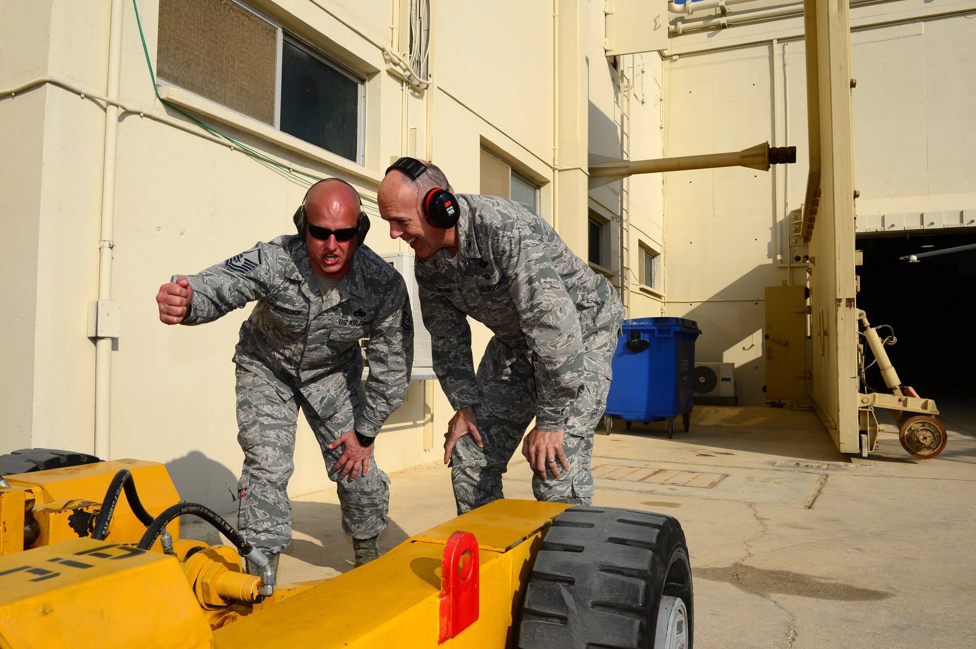 Master Sgt. Jeremy Carlock, 48th Aircraft Maintenance Squadron productions superintendent, describes how maintenance personnel are adapting their procedures in a deployed environment to Brig. Gen. John Shapland, U.S. Defense Attaché to Israel, prior to the Blue Flag exercise at Uvda Air Force Base, Israel, Nov. 20, 2013. Shapland met with Airmen from Royal Air Force Lakenheath, England, and other allied nations prior to the exercise, which ran Nov. 24-28. Blue Flag was a multinational aerial warfare exercise hosted by Israel which improved operational capability, combat effectiveness, understanding and cooperation between the U.S., Israel, Greece and Italy.  (U.S. Air Force photo by Master Sgt. Lee Osberry/Released)