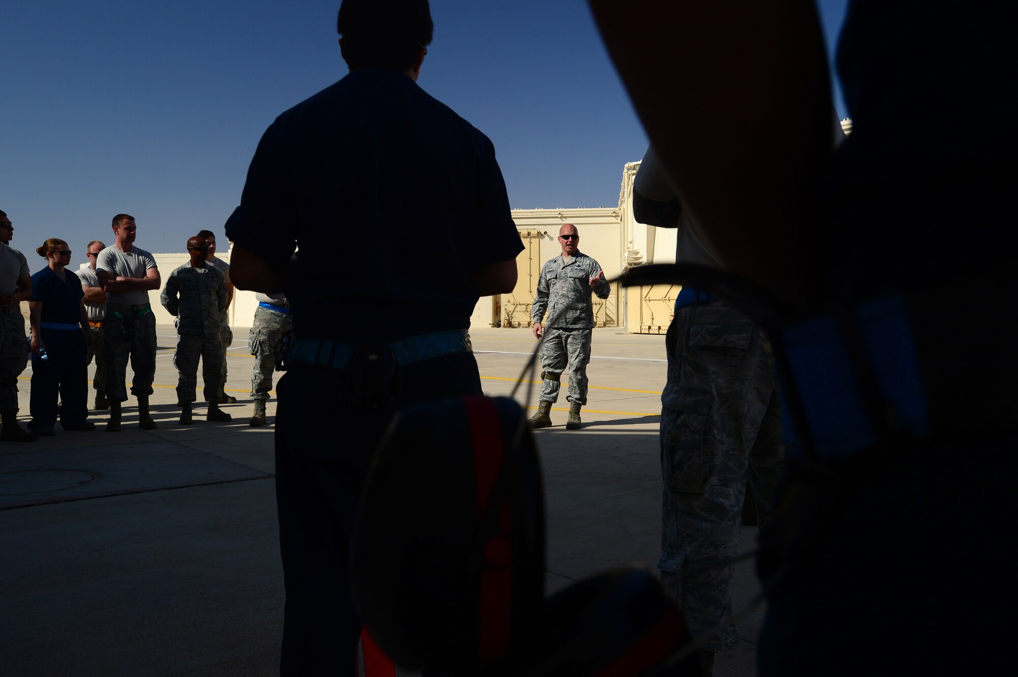 Master Sgt. Jeremy Carlock, 48th Aircraft Maintenance Squadron production superintendent, briefs maintenance personnel in preparation for the Blue Flag exercise at Uvda Air Force Base, Israel, Nov. 19, 2013. The exercise was conducted Nov. 24-28 to help strengthen the relationships between the nations, while ensuring regional peace and stability.  (U.S. Air Force photo by Master Sgt. Lee Osberry/Released)