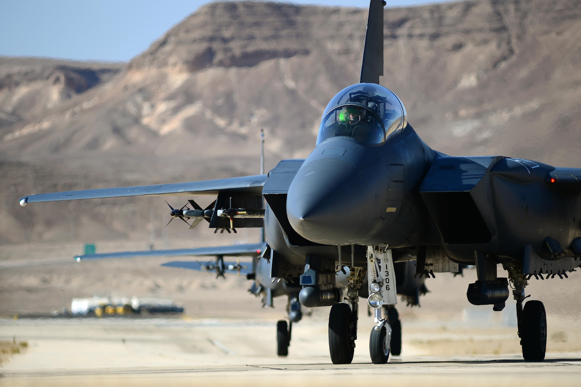 An F-15E Strike Eagle taxis to the maintenance area following a combat mission during the Blue Flag exercise Nov. 26, 2013, on Uvda Air Force Base, Israel.  Aircraft from the 492nd Fighter Squadron, Royal Air Force Lakenheath, England deployed to participate in the exercise, which promoted improved operational capability, combat effectiveness, understanding and cooperation between the U.S., Israel, Greece, and Italy. (U.S. Air Force photo/Master Sgt. Lee Osberry)