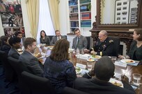18th Chairman of the Joint Chiefs of Staff Gen. Martin E. Dempsey speaks with White House Fellows in Washington D.C., Nov. 26, 2013. The purpose of the White House Fellows program is to provide gifted and highly motivated young Americans with some first-hand experience in the process of governing the Nation and a sense of personal involvement in the leadership of society. DoD photo by Staff Sgt. Sean K. Harp
