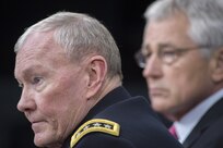18th Chairman of the Joint Chiefs of Staff Gen. Martin E. Dempsey and Secretary of Defense Chuck Hagel brief the press at the Pentagon, Dec. 4, 2013.  DoD photo by Mass Communication Specialist 1st Class Daniel Hinton