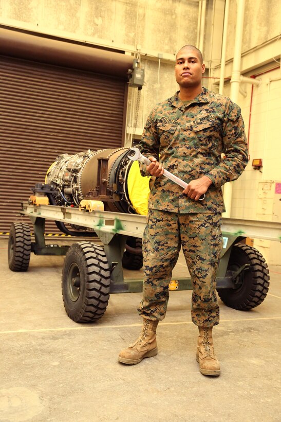 Sgt. Phillip J. McCleveland stands in front of a J-52 jet engine, which powers the EA-6B Prowler, Dec. 3 at Marine Corps Air Station Cherry Point. McCleveland is a jet engine mechanic with Marine Aviation Logistics Squadron 14.



