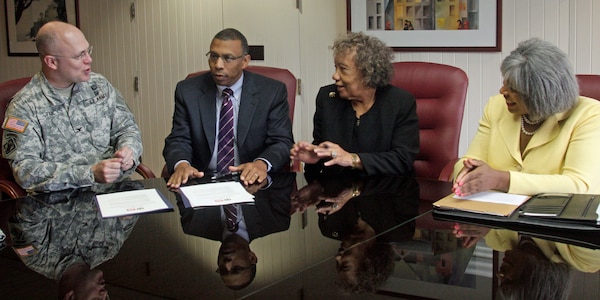 Little Rock District commander Col. Courtney W. Paul, University of Pine Bluff Chancellor Laurence B. Alexander, UAPB’s vice chancellor for Academic Affairs Mary E. Benjamin, and Little Rock District Contracting Chief Sandra Easter, who is also a UAPB alumna, discuss the new Science, Technology, Engineering, Mathematics Memorandum of Understanding between the district and university.