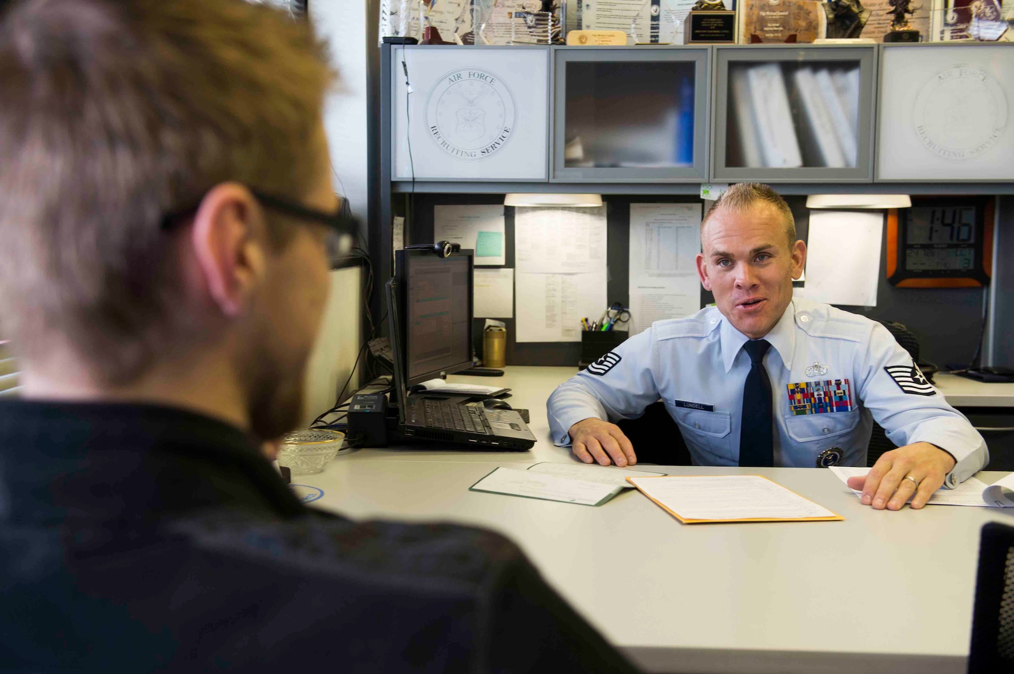 Tech. Sgt. Michael Lundell meets with a possible delayed entry program candidate Utah, Oct. 3, 2013, in West Valley, Utah. Out of the 50 to 100 people Lundell talks to each week following all of his school visits, office consultations, and phone conversations, only 10 percent qualify to become airmen. Lundell is a 368th Recruiting Squadron recruiter. (U.S. Air Force photo/Senior Airman Tiffany DeNault)
