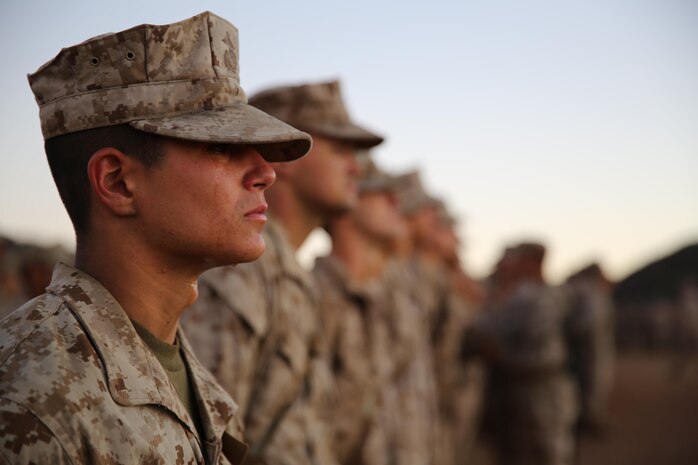 Tears fall from recruit Braden T. Kooiman, Company B, 1st Recruit Training Battalion, after he received his eagle, globe, and anchor
during the emblem ceremony at Edson Range aboard Marine Corps Base Camp Pendleton, Calif, Oct. 31. The culminating event of the
Crucible is a nine-mile hike that includes a 700-foot hill known as the “Reaper.”