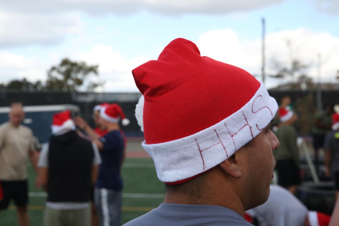 Marines, Sailors and civilians aboard Marine Corps Air Station Miramar participate in the Jingle Bell Jog Dec. 5. Participants wore different hats and outfits throughout the event. 