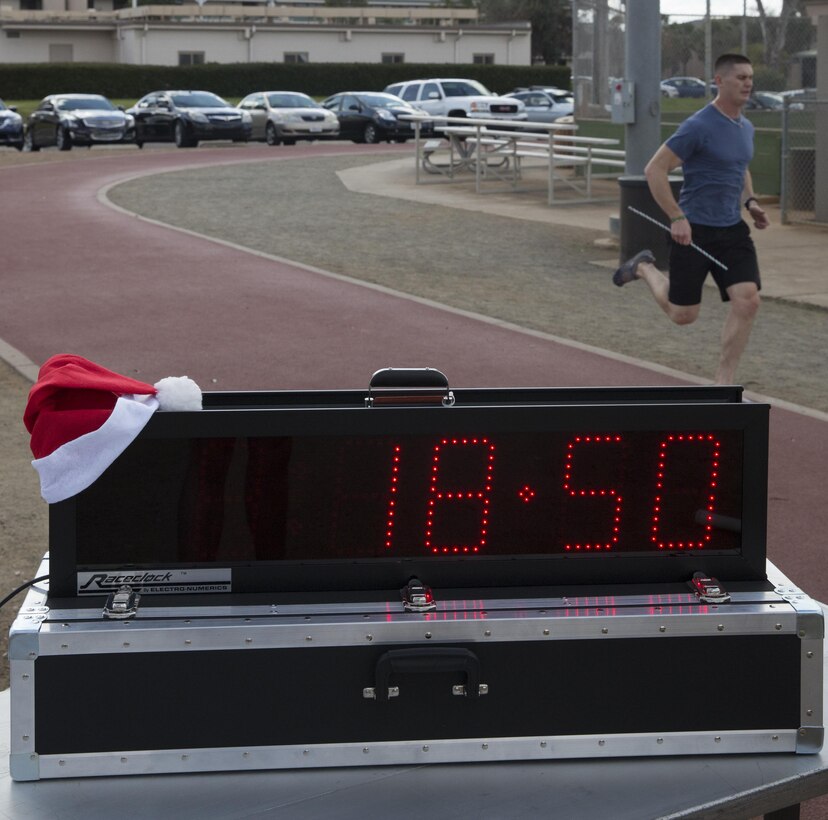 Cpl. Chad Jenson, a ground radio repair Marine with Marine Tactical Air Command Squadron 38, finished first in the Jingle Bell Jog aboard Marine Corps Air Station Miramar, Calif., Dec. 5. Jenson received free gifts for also finding one of the hidden candy canes spread throughout the running course. 