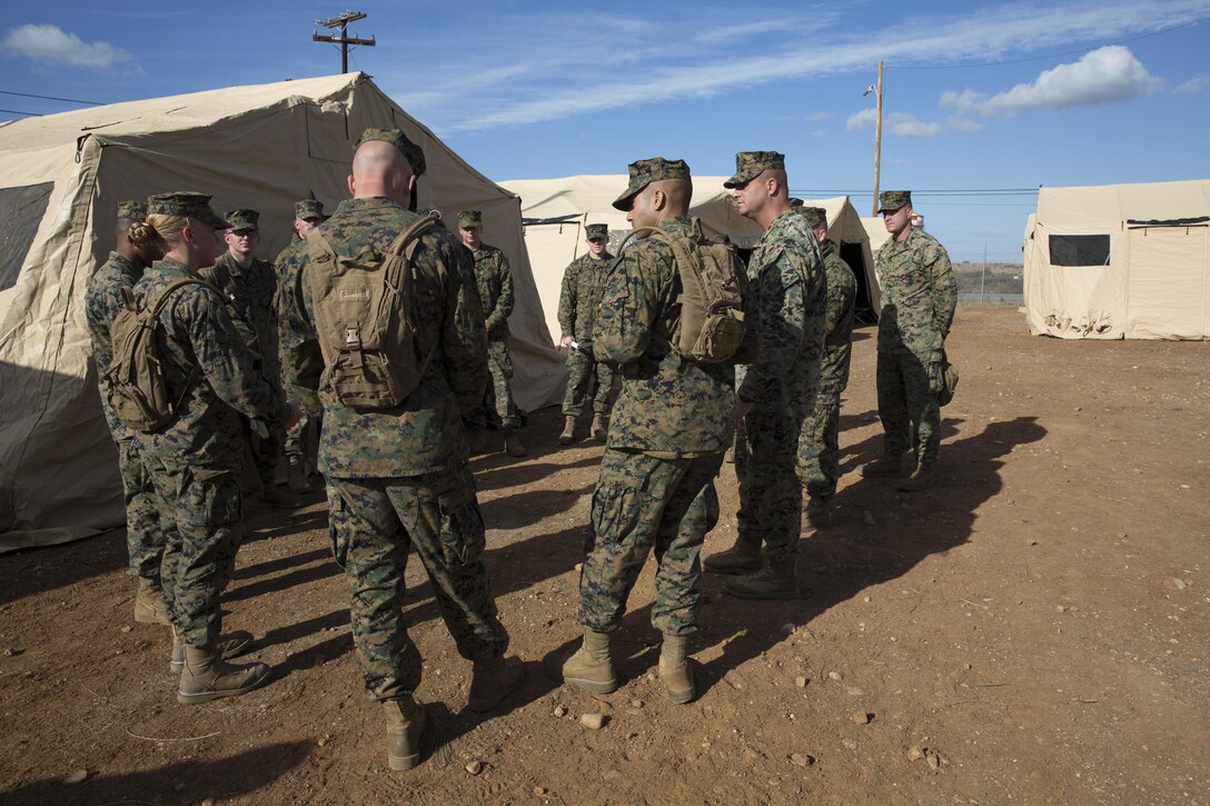Mentors and newly promoted corporals discuss leadership during the Corporals Committed and Engaged Leadership Indoctrination aboard Marine Corps Air Station Miramar, Calif., Dec. 4. The corporals indoctrination is a recently implemented course to provide newly promoted noncommissioned officers with leadership techniques. 