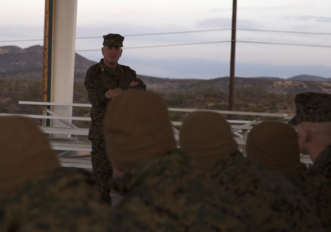 Maj. Gen. Steven Busby, commanding general of 3rd Marine Aircraft Wing, listens as a newly promoted corporal asks a question during the Corporals Committed and Engaged Leadership Indoctrination aboard Marine Corps Air Station Miramar, Calif., Dec. 4. Busby started the three-day course to teach new noncommissioned officers about leadership techniques and their new responsibilities as part of the Committed and Engaged Leadership initiative.