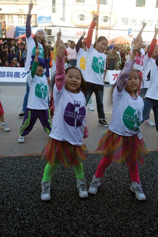 Children perform at the International Carnival in Okinawa City Nov. 30 in Koza Music Town after a parade. Participants of the parade included people from Okinawa and the international community. (U.S. Marine Corps photo by Lance Cpl. Diamond N. Peden/Released)