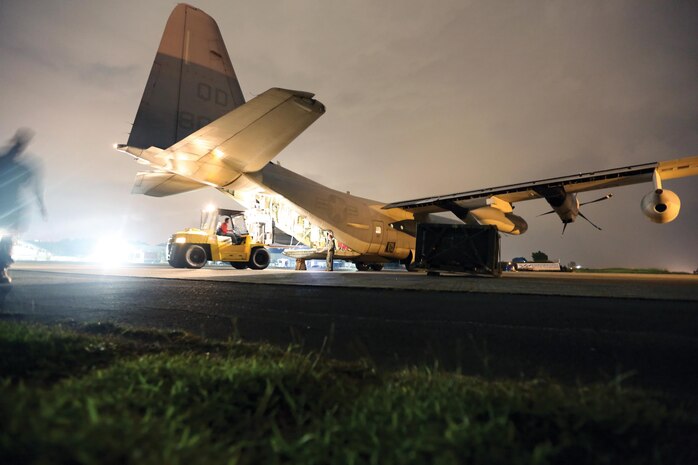 A fork lift is used  to unload a KC-130J Super Hercules  with Marine Aerial Refueler Transport Squadron 152 (VMGR-152), Marine Aircraft Group 36, 1st Marine Aircraft Wing, in support of Joint Task Force 505, on Villamor Airbase, Philippines, Nov. 24, 2013.  U.S. Marines with VMGR-152, flew from Tacloban to Villamor Airbase carrying supplies and personal in support of Operation Damayan.  (U.S. Marine Corps photo by Lance Cpl. Jeraco Jenkins/Released)