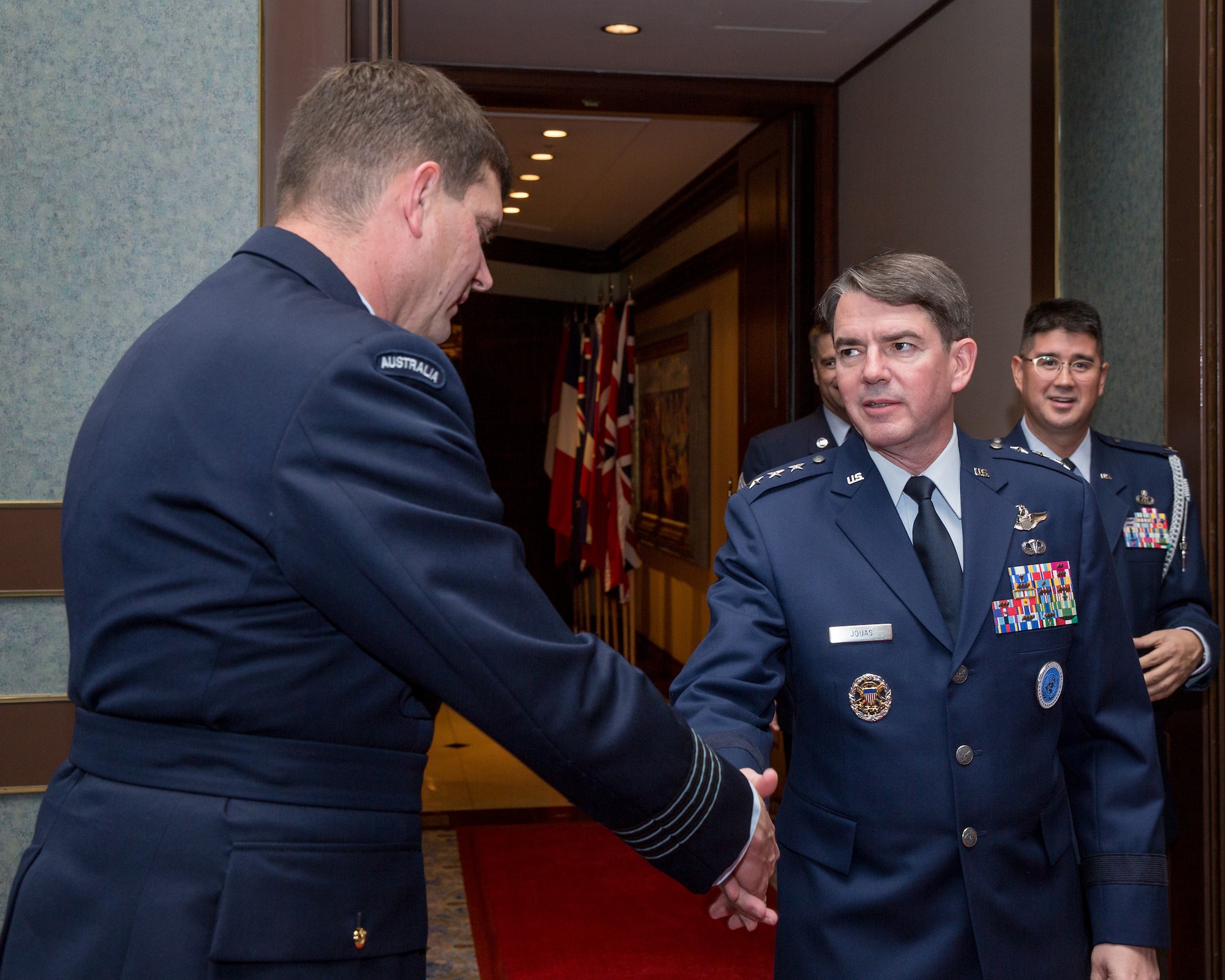 (from left to right) Royal Australian Air Force Group Captain Luke Stoodley, United Nations Command (Rear) commander, greets U.S. Air Force Lt. Gen. Jan-Marc Jouas, United Nations Command Korea, deputy commander, U.S. Forces Korea, deputy commander, Air Component Commander, Republic of Korea/U.S. Combined Forces Command, commander, 7th Air Force, commander, during the 68th Anniversary of the United Nations, Nov. 26, 2013 at New Sanno Hotel. The United Nations Command was established by UN Security Council Resolution 84 on July 7, 1950 in Tokyo. The command continues to support the Korean Armistice Agreement which was signed July 27, 1953, ending open hostilities. (U.S. Air Force photo by Osakabe Yasuo/Released)