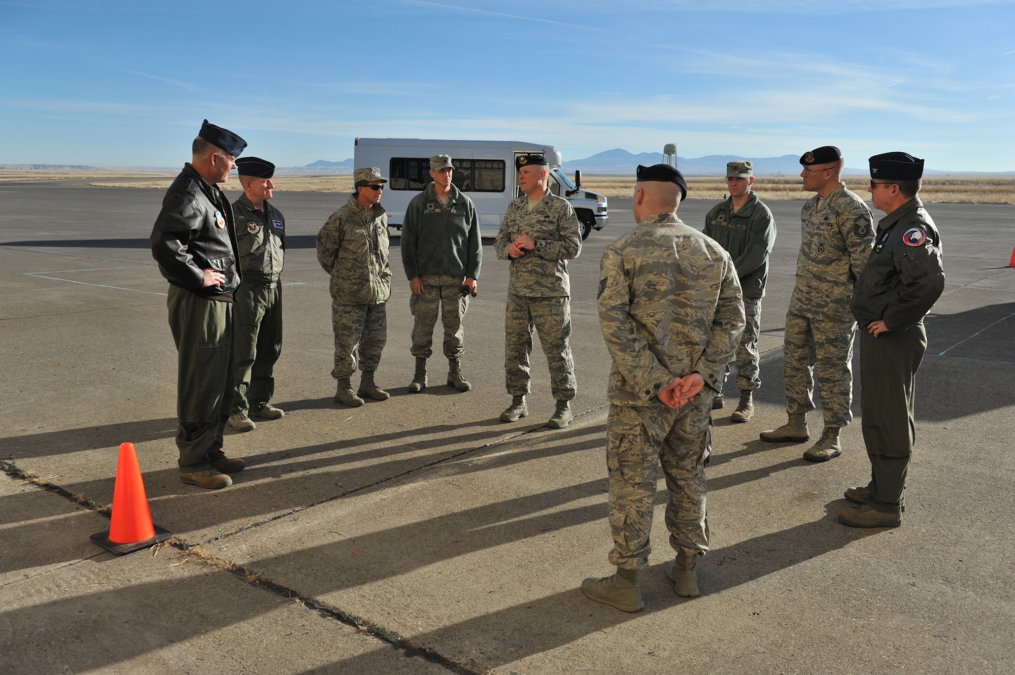Maj. Brian Copper, 341st Security Support Squadron commander (center), briefs a small group in front of the Tactical Response Force shoothouse Nov. 26.  Four commanders of the Montana Air National Guard were able to take part in a tour and watch a demonstration by 341st Security Forces Group members.  (U.S. Air Force photo/John Turner)
