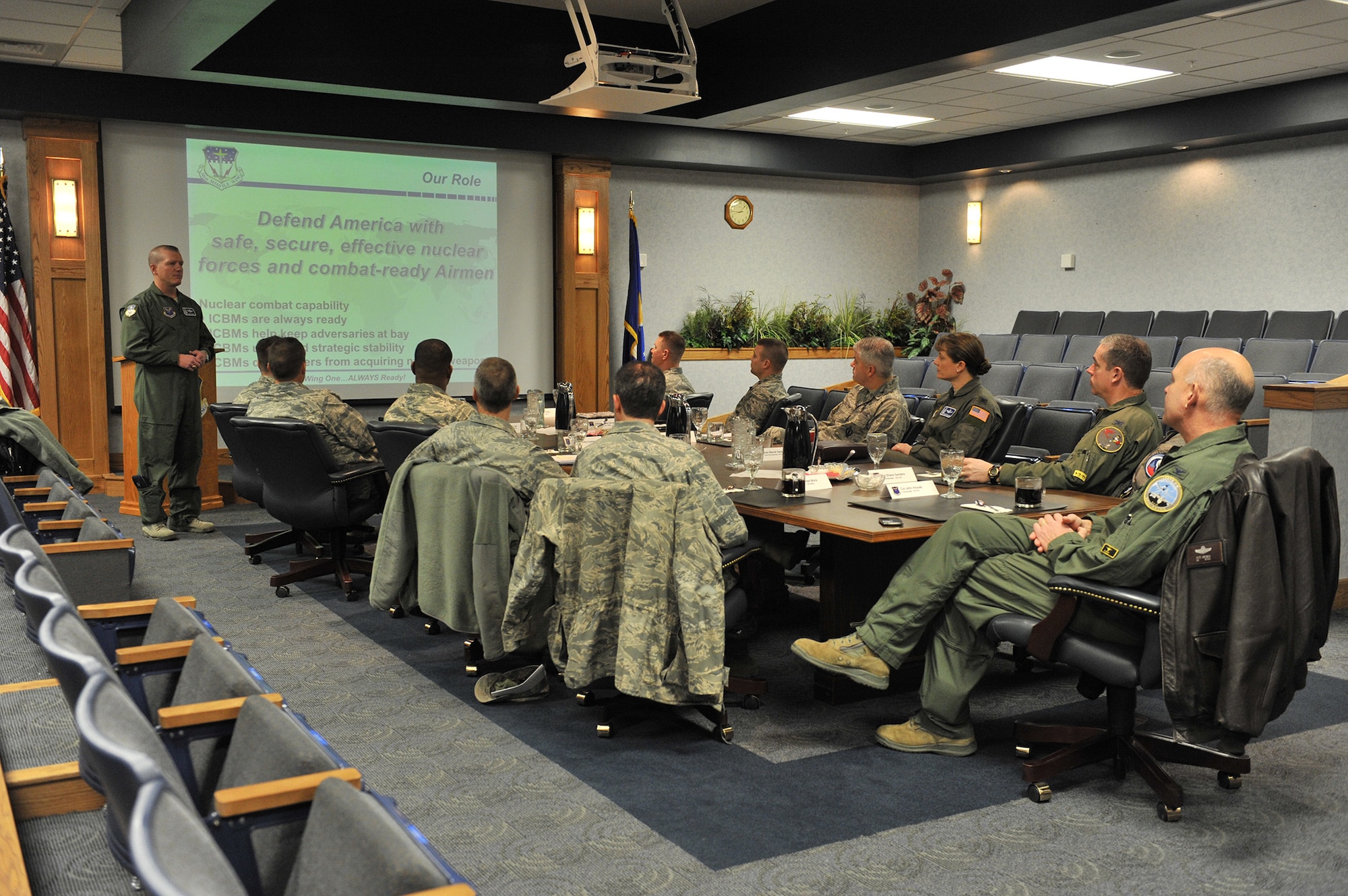 Col. Robert Stanley, 341st Missile Wing commander (left), provides a mission briefing to members of the Montana Air National Guard and other Wing One leaders.  Four members of MTANG leadership visited Malmstrom Air Force Base for a day-long tour Nov. 26.  (U.S. Air Force photo/John Turner)