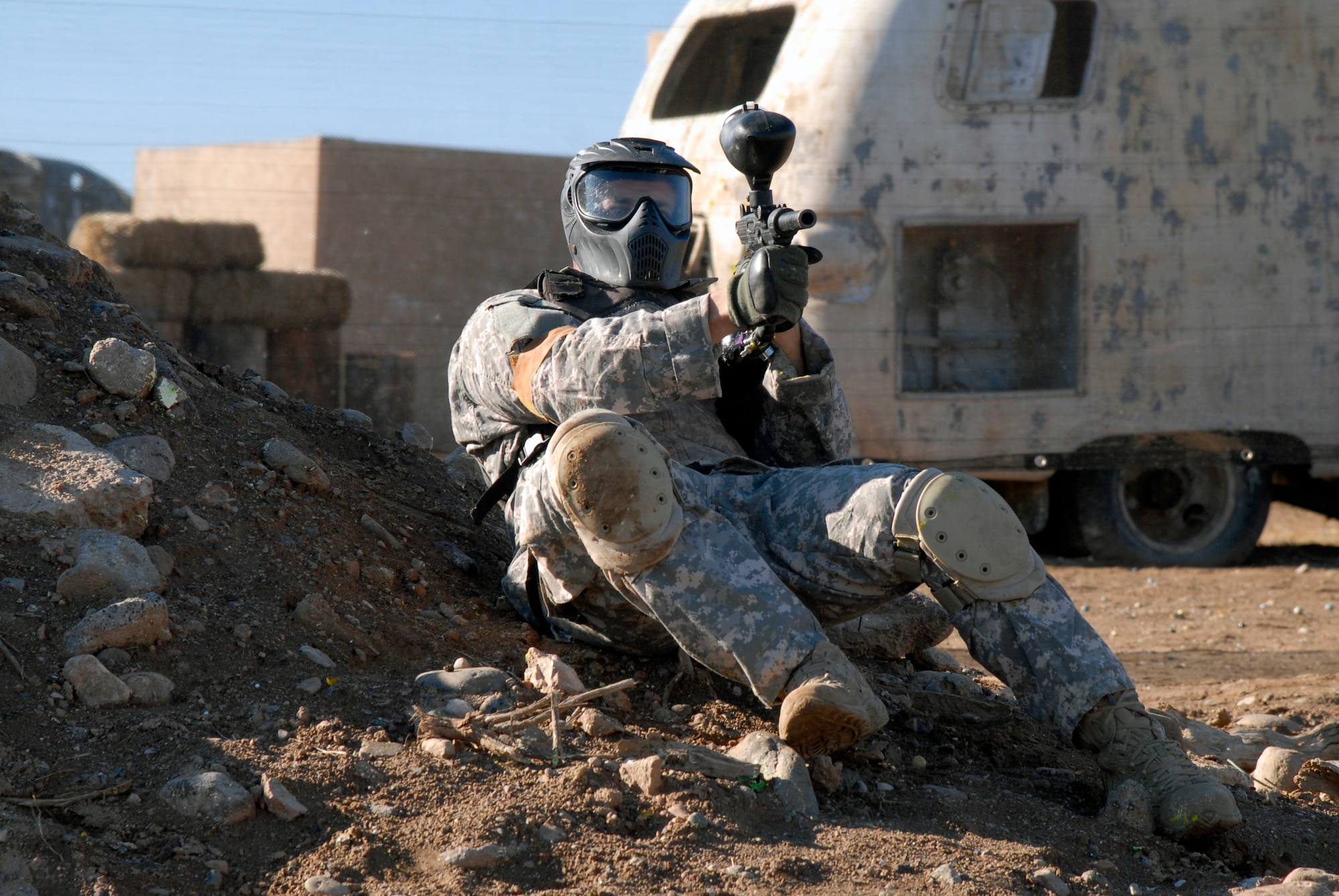 Lt. Col. Patrick Launey, 56th Logistics Readiness Squadron commander, returns fire to the opposing team during a paintball game Nov. 25 at Fighter Town Paintball in El Mirage. Luke Air Force Base commanders participated to build camaraderie and esprit de corps. (U.S. Air Force photo/Airman 1st Class Pedro Mota)