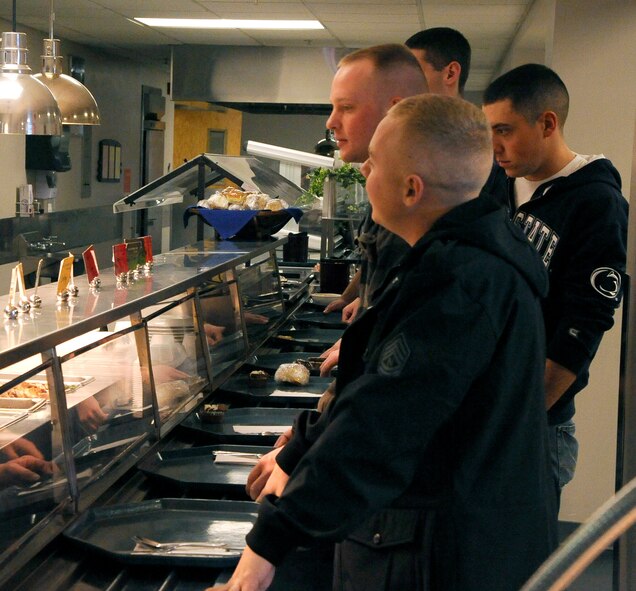 Team Malmstrom members line up to be served a Thanksgiving lunch Nov. 28. According to Airmen who attended, this has been one of Malmstrom’s best Thanksgiving meals to date. (U.S. Air Force photo/Airman 1st Class Collin Schmidt)