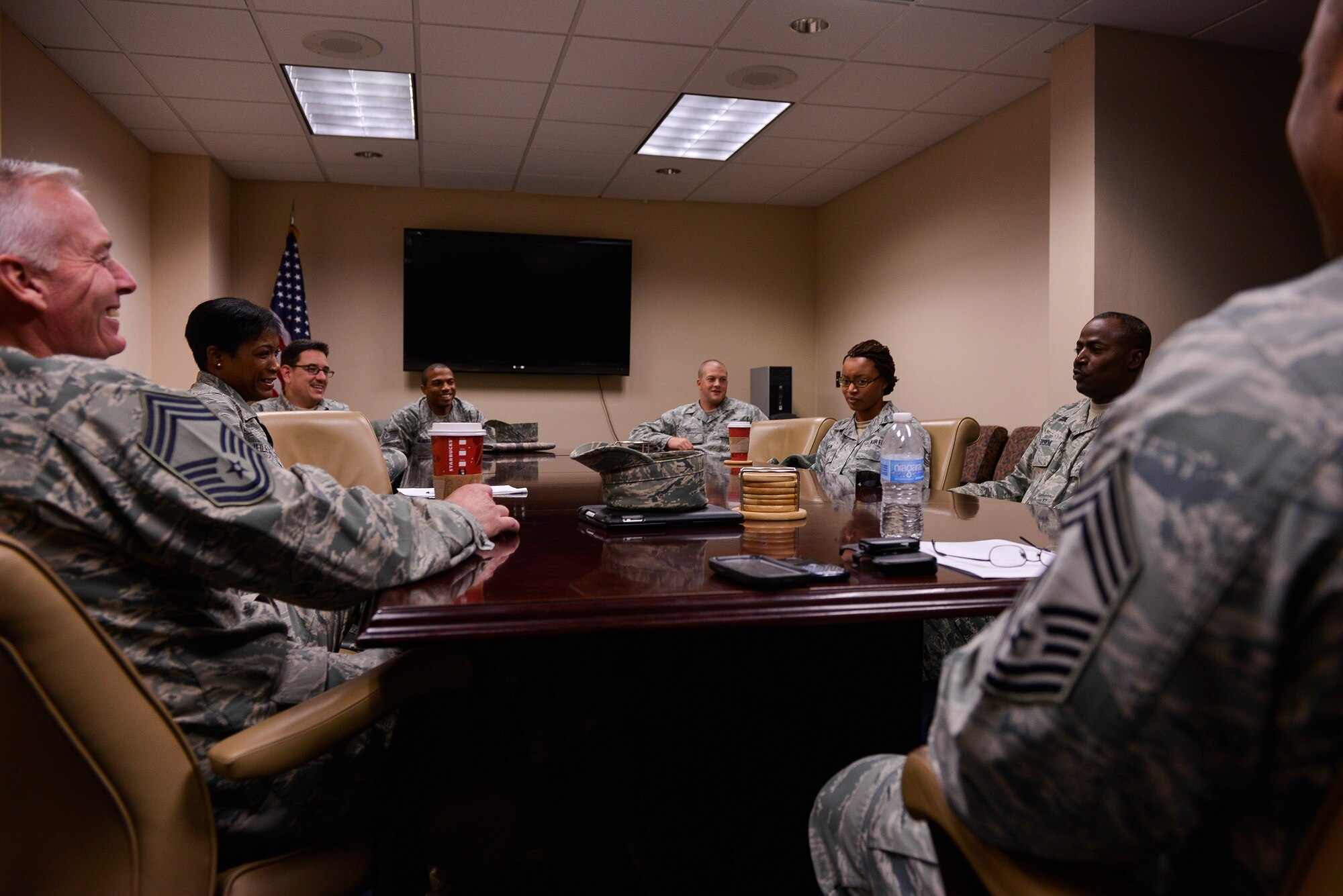 Participants of the Chief to Airman Mentor Program gather for the end-of-day feedback session Nov. 13, 2013, at Little Rock Air Force Base, Ark. The feedback session gave the Airmen an opportunity to compare experiences and provide suggestions for future iterations.   (U.S. Air Force photo by Staff Sgt. Russ Scalf)

