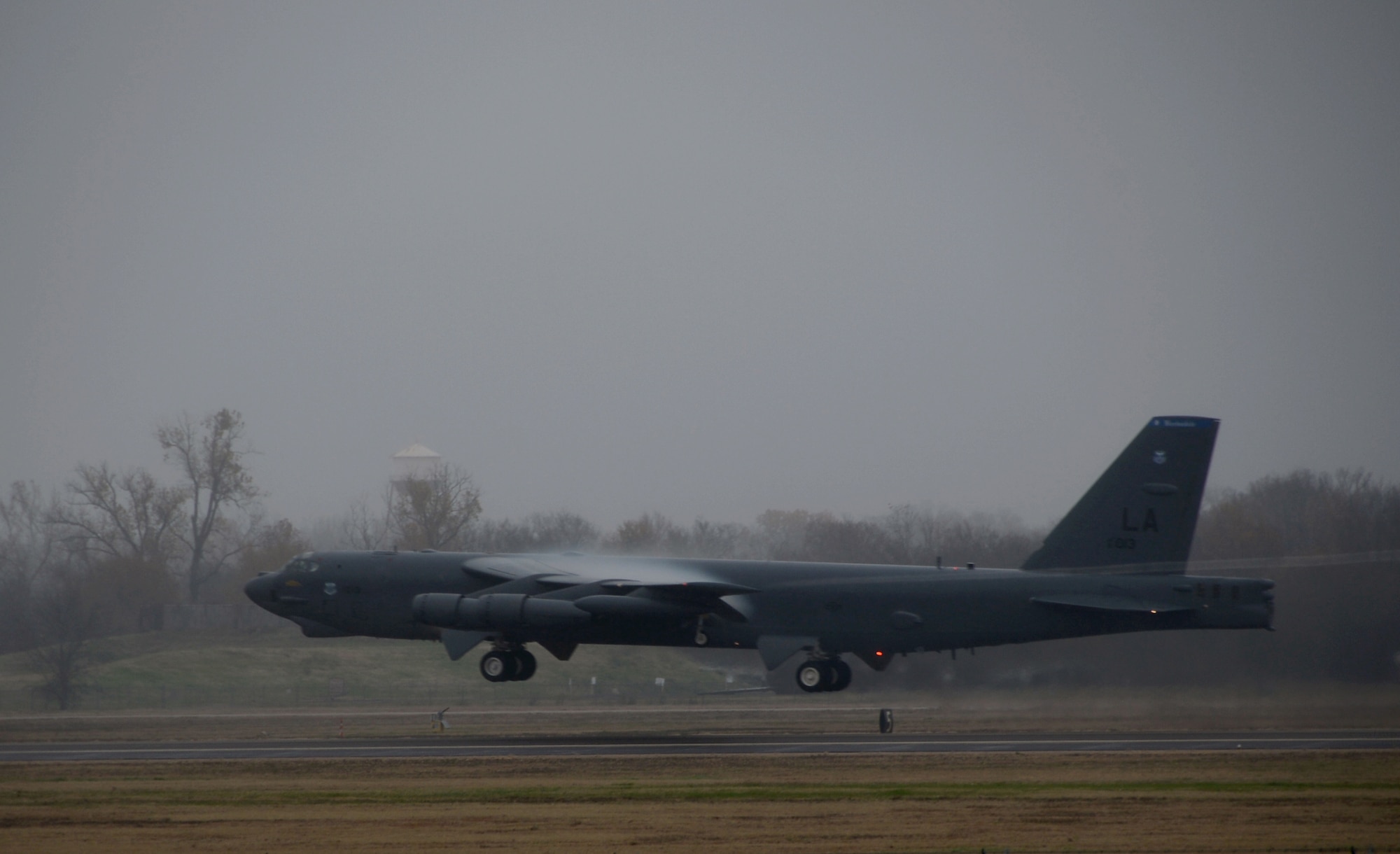 A B-52H Stratofortress executes a minimum interval takeoff from the flightline at Barksdale Air Force Base, La., Dec. 5, 2013. The accelerated launch procedure allows our deterrent force to respond as rapidly as possible when called upon. The long range and versatility of the B-52 make it the weapon of choice for providing deterrence, demonstrating U.S. resolve and combat operations around the world.  (U.S. Air Force photo/Staff Sgt. Amber Corcoran)