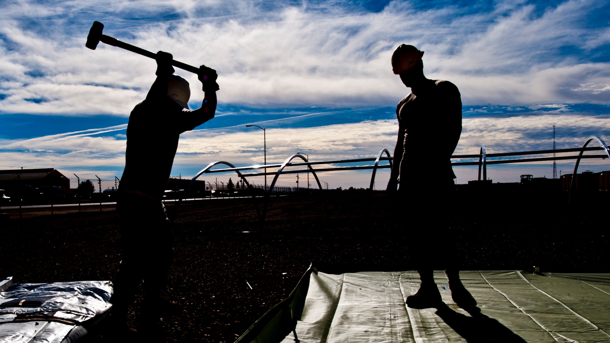 49th Materiel Maintenance Squadron structures Airmen work to construct a Small Shelter System at Holloman Air Force Base, N.M., Dec. 2. The Airmen trained on building fully-ventilated structures such as the SSS to maintain skills needed during construction in deployed environments. The 49th MMS accomplishes the mission by sending large, all-inclusive packaged equipment to deployed locations or to areas impacted by natural disasters. (U.S. Air Force photo by Senior Airman Daniel E.Liddicoet/Released)