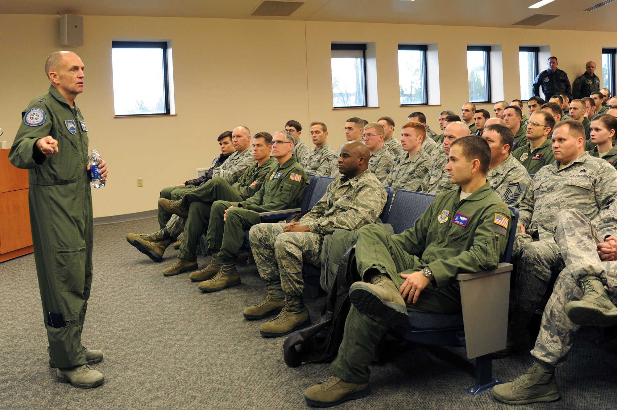 Ret. Lt. Gen. Ralph J. Jodice II, former commander of North Atlantic Treaty Organization Allied Air Command Headquarters at Izmir, Turkey, speaks with Airmen during his visit at Fairchild Air Force Base, Wash., Dec. 2, 2013. Jodice visited Fairchild to thank the 92nd Air Refueling Wing and share some of his experiences while in the military. (U.S. Air Force photo by Airman 1st Class Janelle Patiño/ Released)