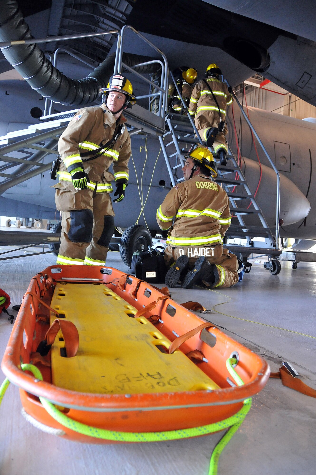 Dobbins Air Reserve Base firefighters respond to a simulated C-130 fuel system malfunction on March 12 here. This was done as part of a confined space exercise conducted annually by the wing inspection team. (U.S. Air Force photo/Senior Airman Elizabeth Van Patten)